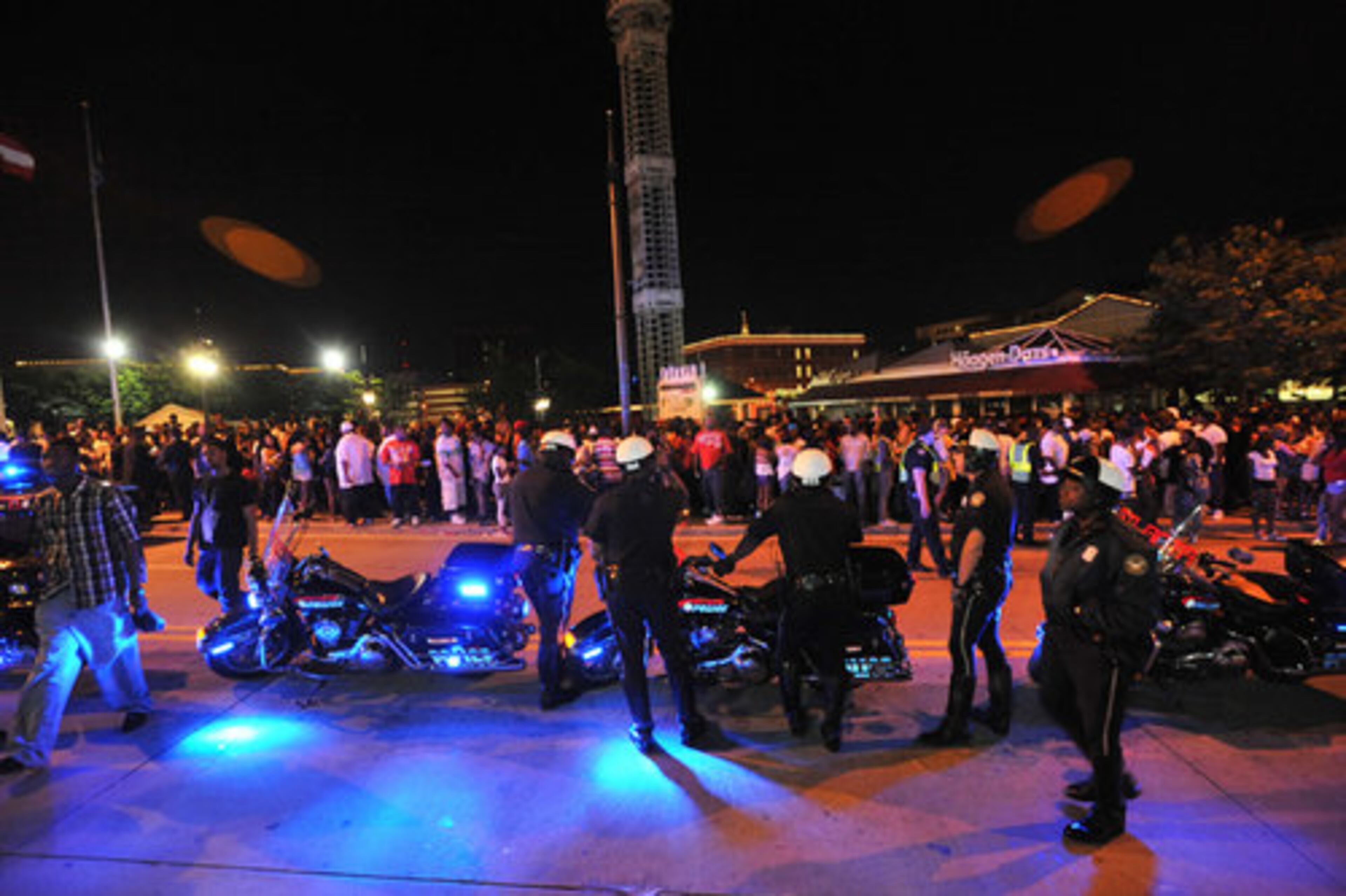 Police keep a close watch on Freaknik participants.