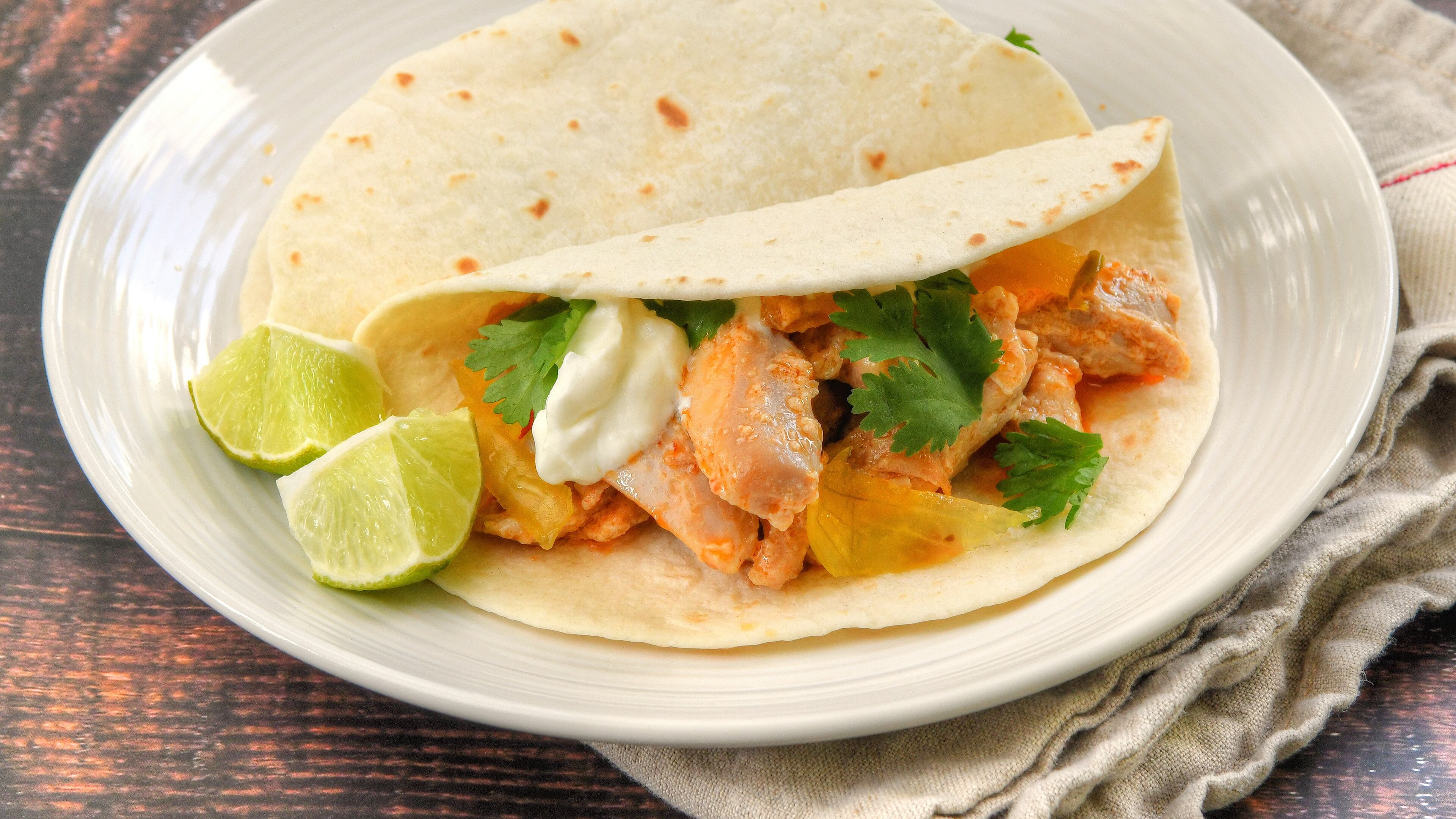 Spicy Chicken Tacos with Pickled Onions. (Chris Hunt for The Atlanta Journal-Constitution)