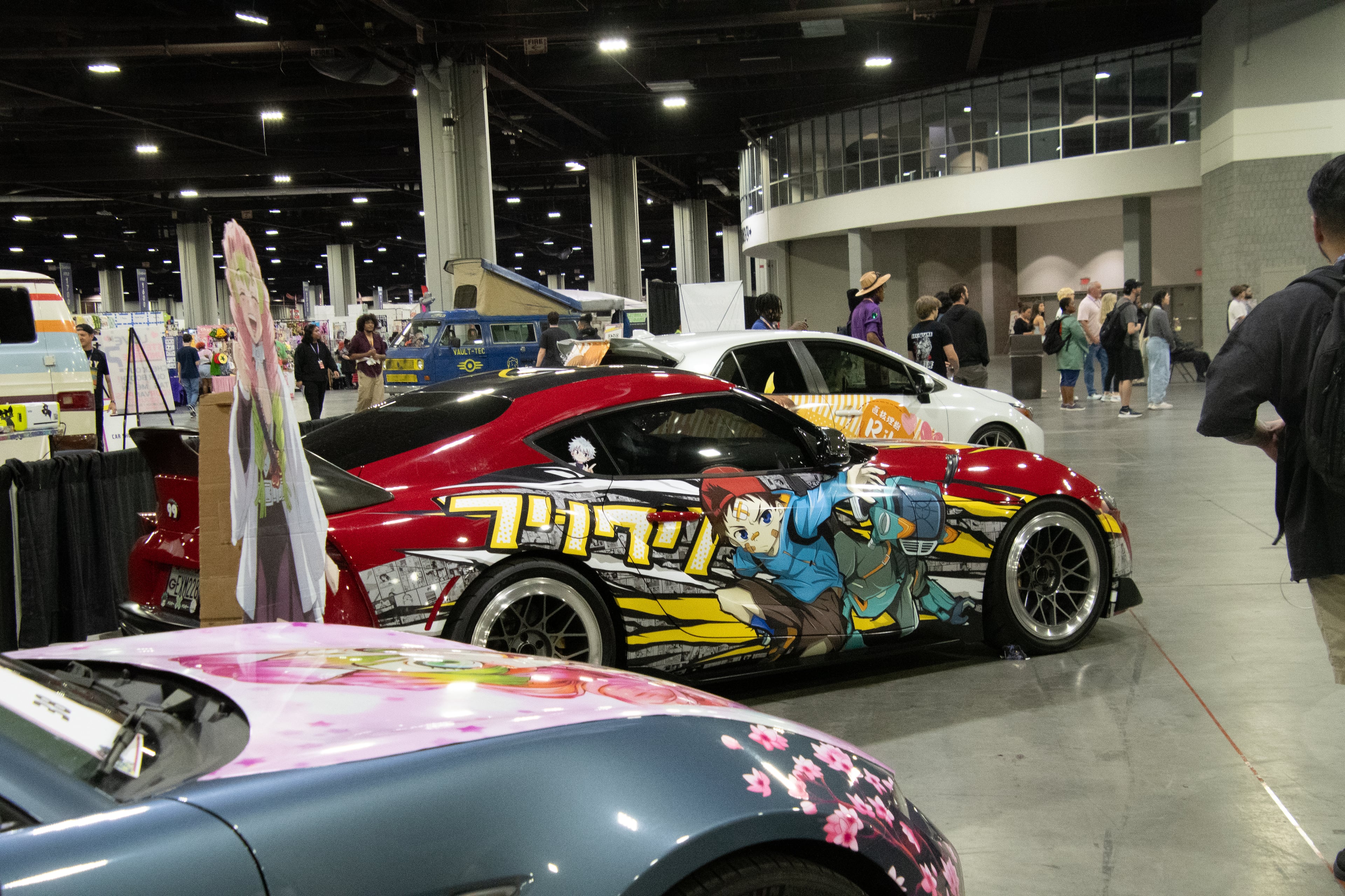 MomoCon's Fan Car Showcase sees dozens of itasha cars — vehicles that have been wrapped in art from anime, manga and video games. (Courtesy of MomoCon)