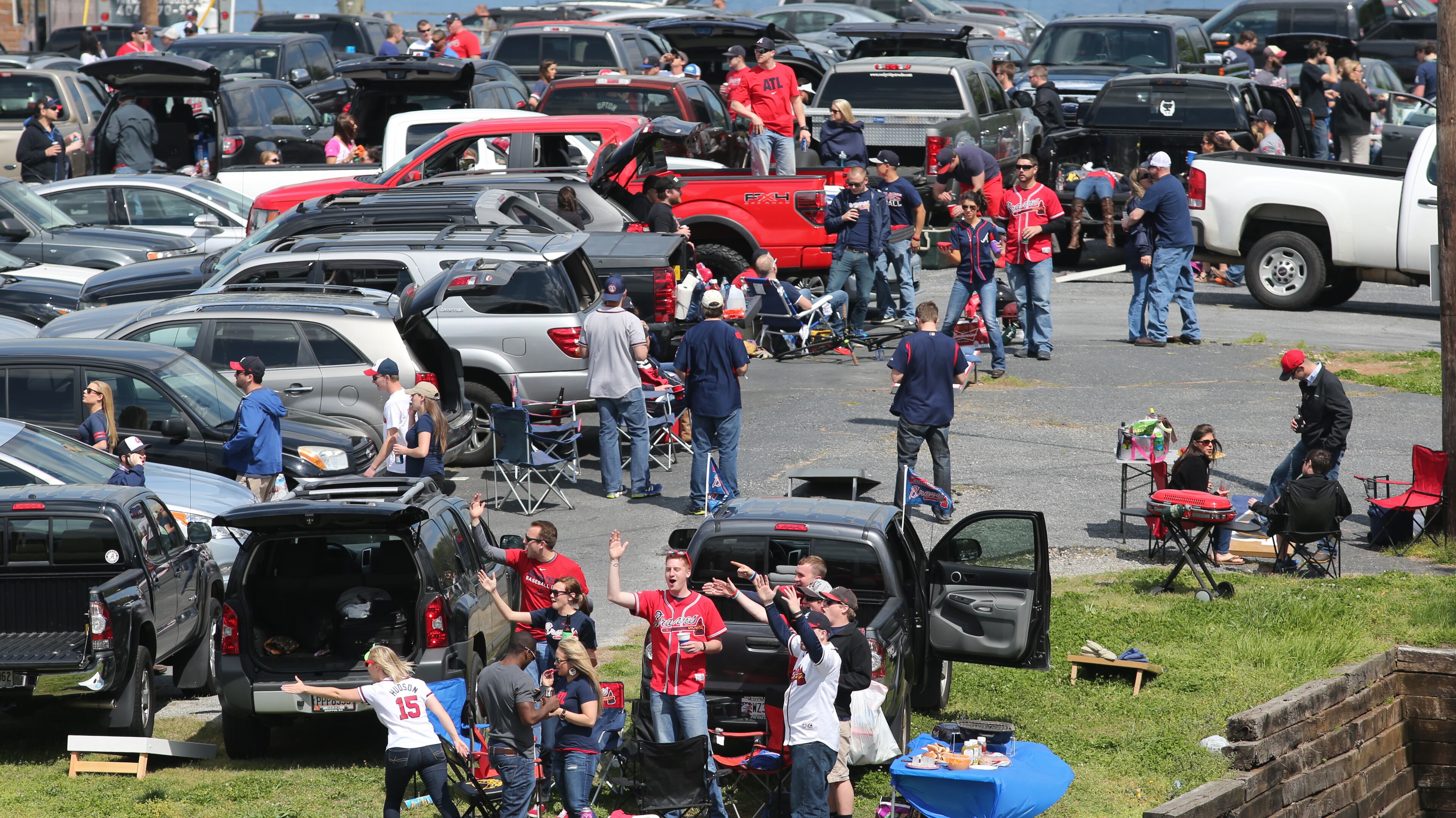 Fans tailgate at the Braves home opener at Turner Field Tuesday afternoon, April 8, 2014.