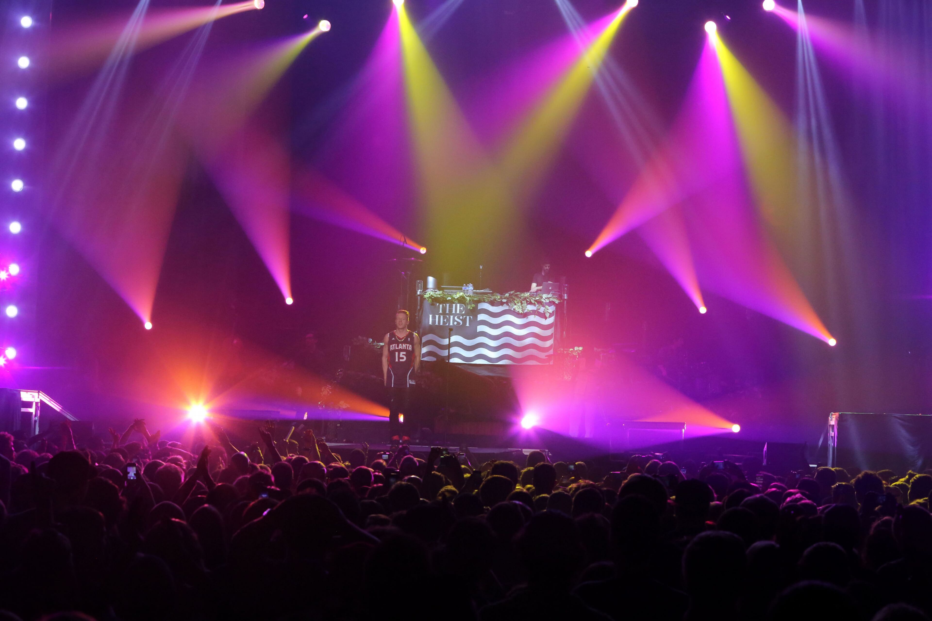 Seattle rapper-producer duo Macklemore & Ryan Lewis packed the Gwinnett Arena Friday night on their "The Heist" tour stop. Talib Kweli and Big K.R.I.T. opened up the show.