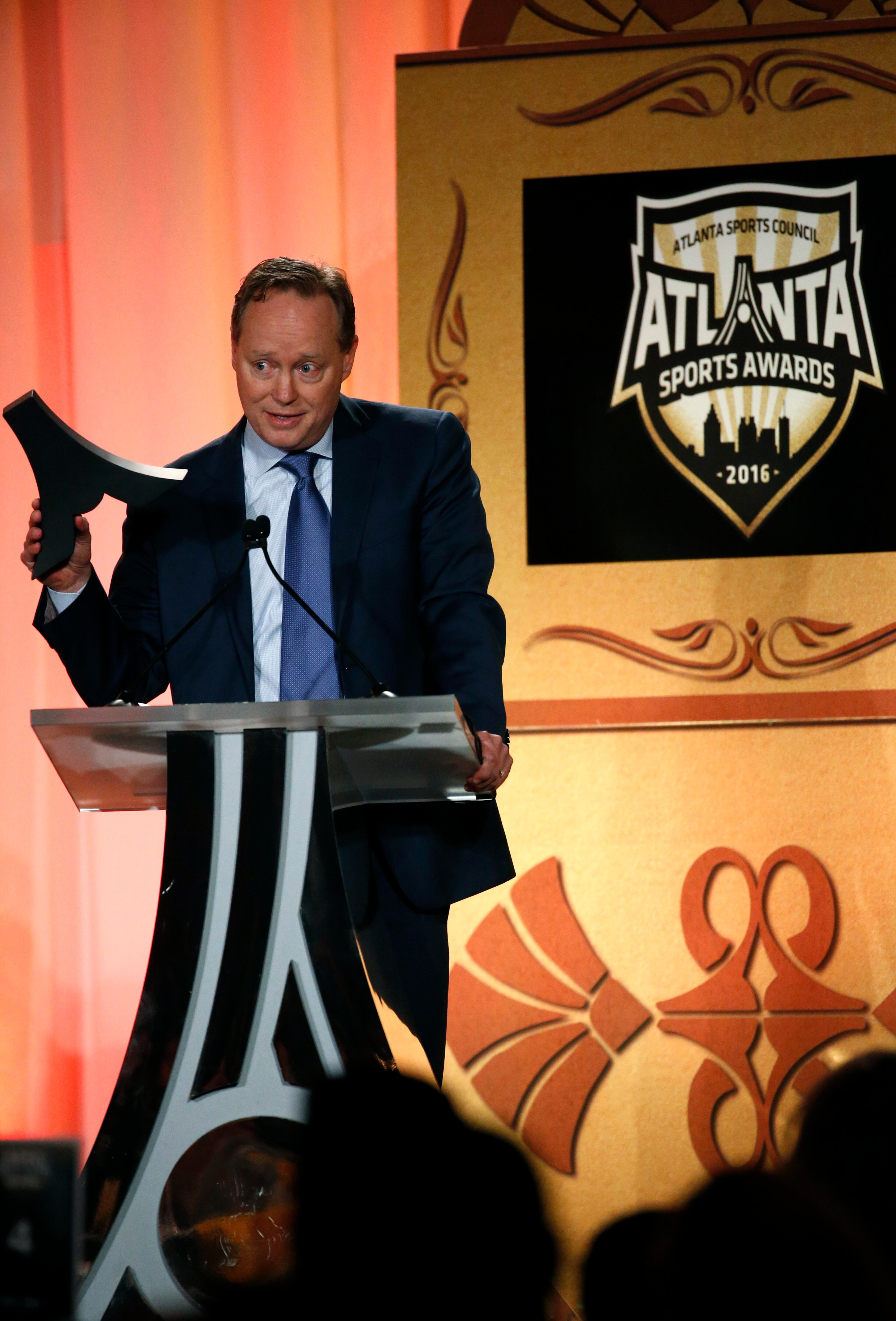 Atlanta Hawks head coach Mike Budenholzer accepts the Coach of the Year award during the Atlanta Sports Awards at the Fox Theatre Thursday, February 25, 2016, in Atlanta. PHOTO / JASON GETZ