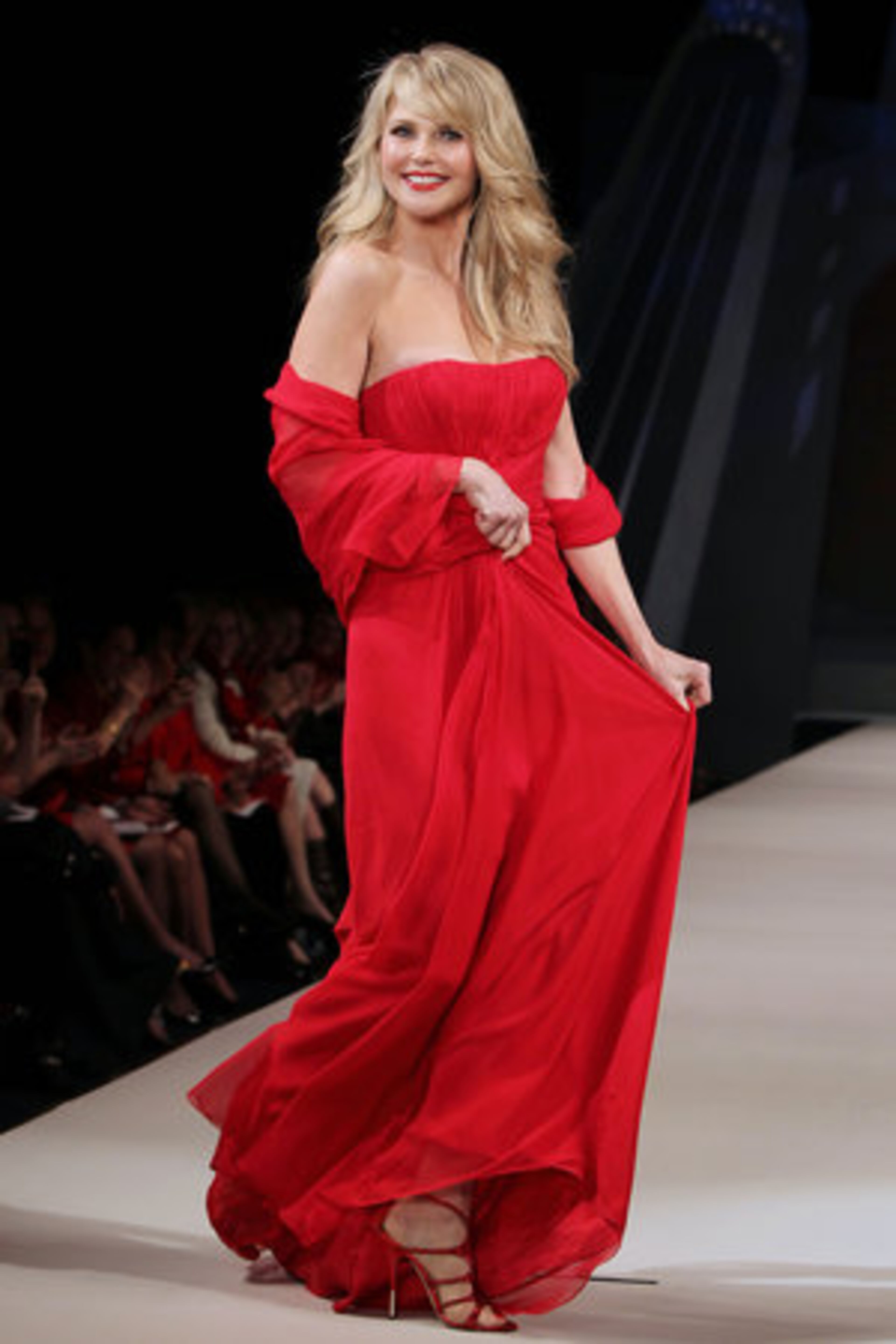 Christie Brinkley models Pamella Roland.