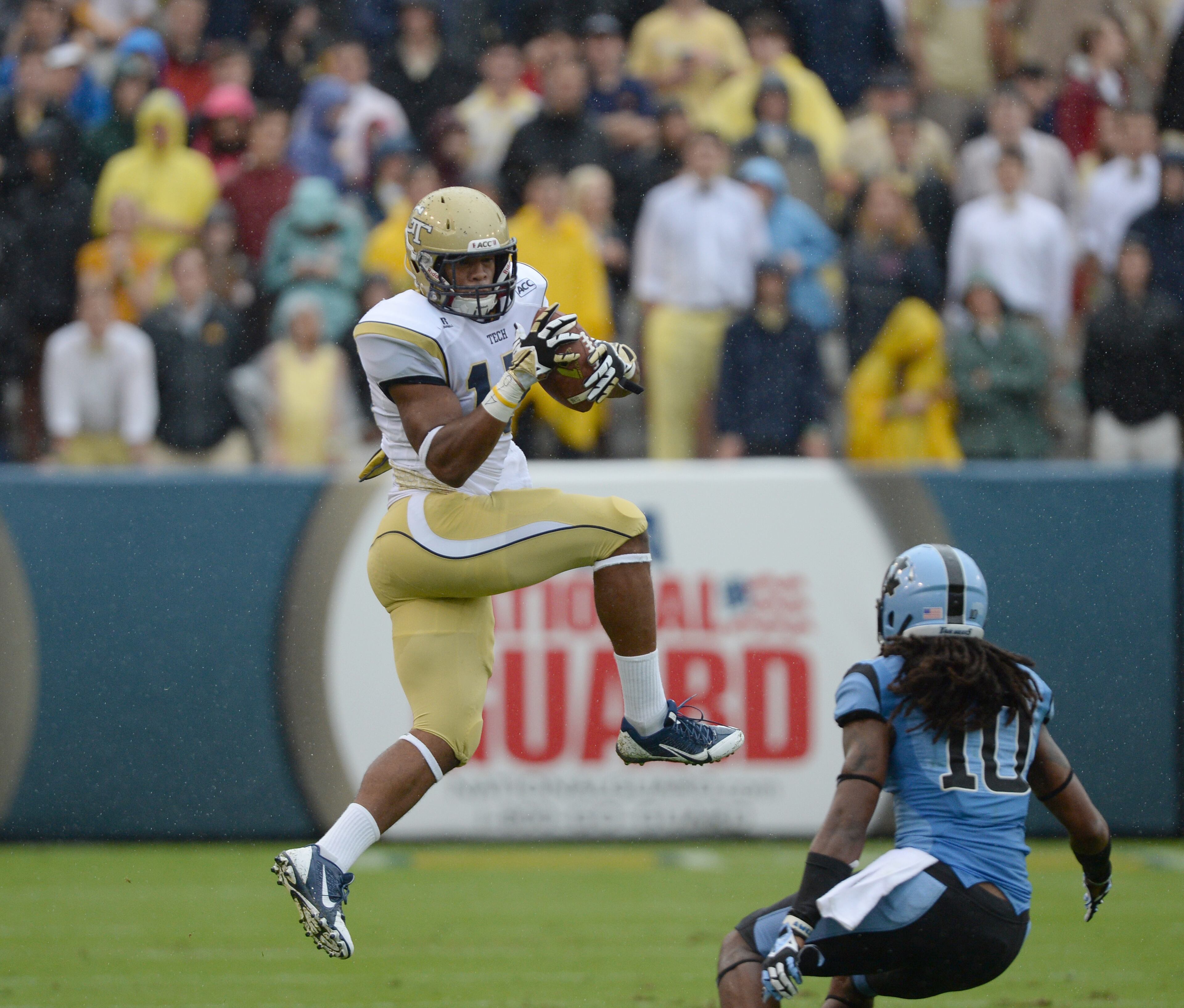 Georgia Tech's DeAndre Smelter (15) hangs in the air after a catch in Bobby Dodd Stadium on Saturday, September 21, 2013. He had three catches for 53 yards. Tech won the game 28 to 20.