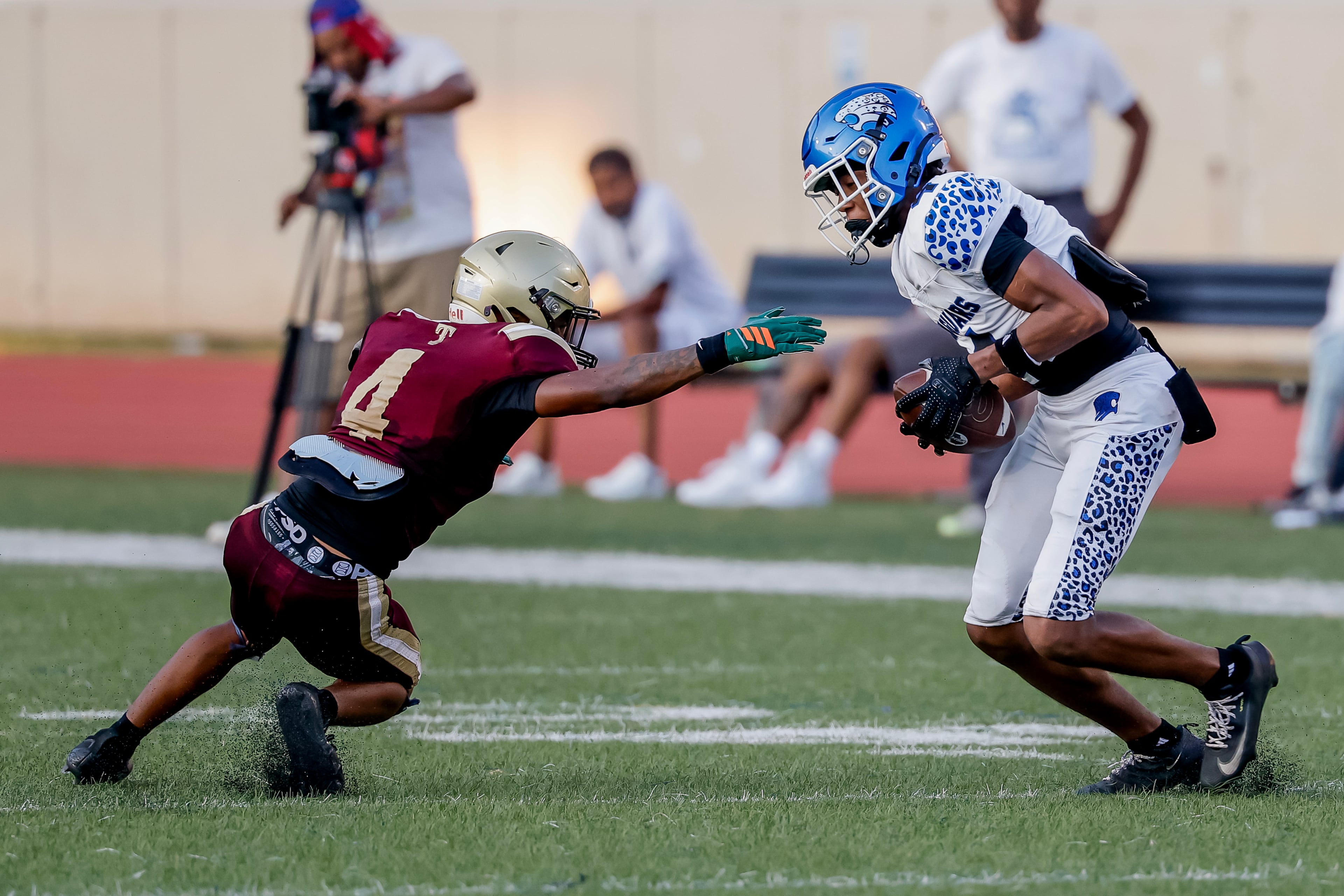 Stephenson’s Micheal Miller (right) makes a reception against Tucker’s Andre Blackburn during their game at Hallford Stadium on Friday, Sept. 4, 2026, in Clarkston. (Erik S. Lesser for the AJC)