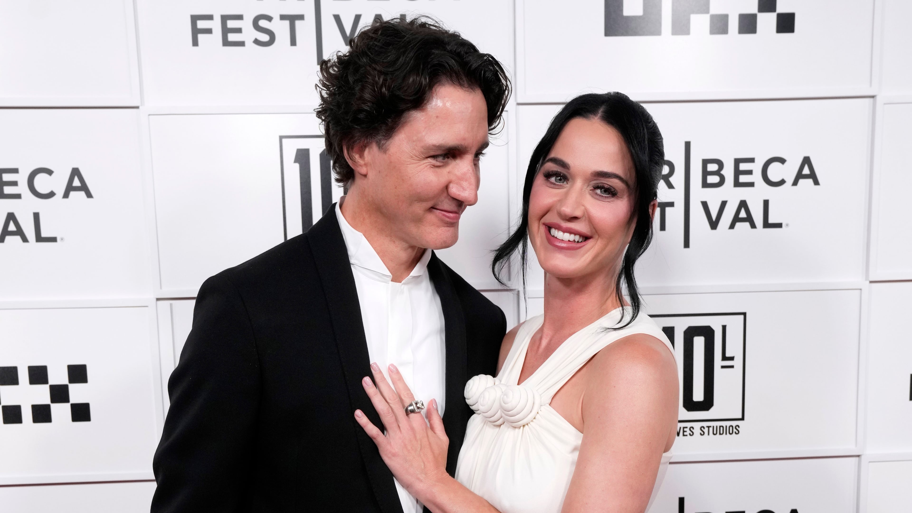 Justin Trudeau, left, and Katy Perry attend the "Katy Perry: The Lifetimes Tour - Live from Paris" world premiere at the OKX Theater at BMCC Tribeca Performing Arts Center during the Tribeca Festival on Monday, May 8, 2026, in New York. (Photo by Charles Sykes/Invision/AP)
