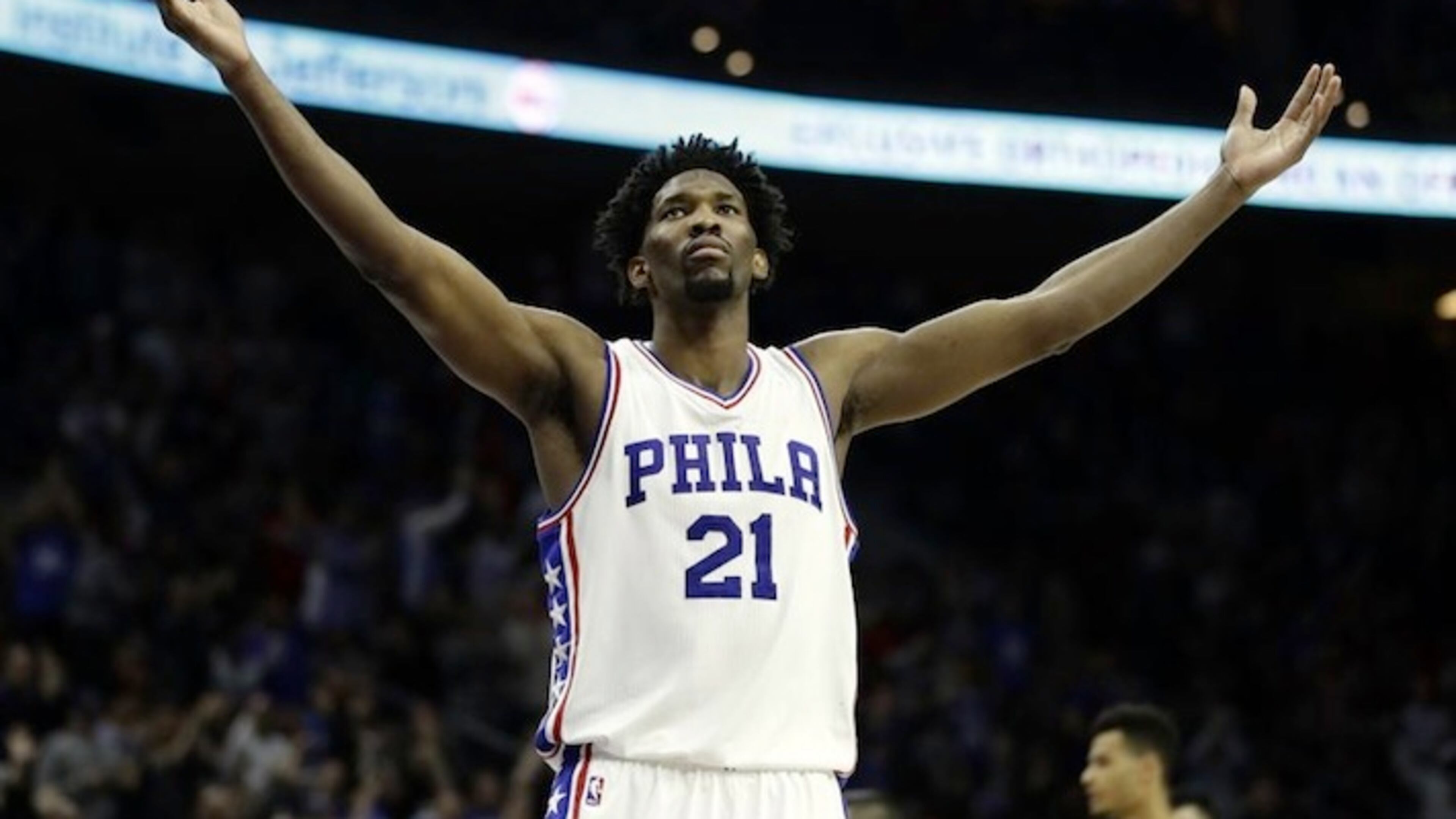In this Jan. 27, 2017, file photo, Philadelphia 76ers' Joel Embiid reacts during an NBA basketball game against the Houston Rockets in Philadelphia. Embiid's numbers are the best in the rookie class. Yet his rookie of the year chances seem very flawed for this reason: Embiid will miss nearly two-thirds of Philadelphia's season because of injuries. AP Photo/Matt Slocum