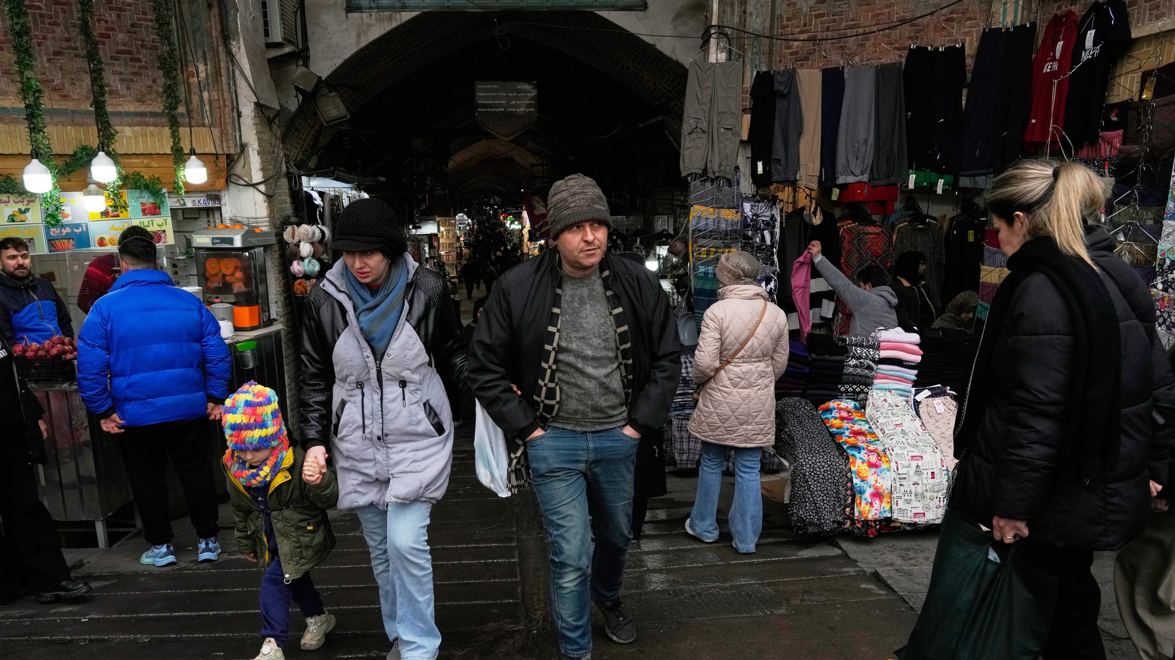 People walk at Tehran's historic Grand Bazaar, Tuesday, Jan. 20, 2026, in Iran. (AP Photo/Vahid Salemi)
