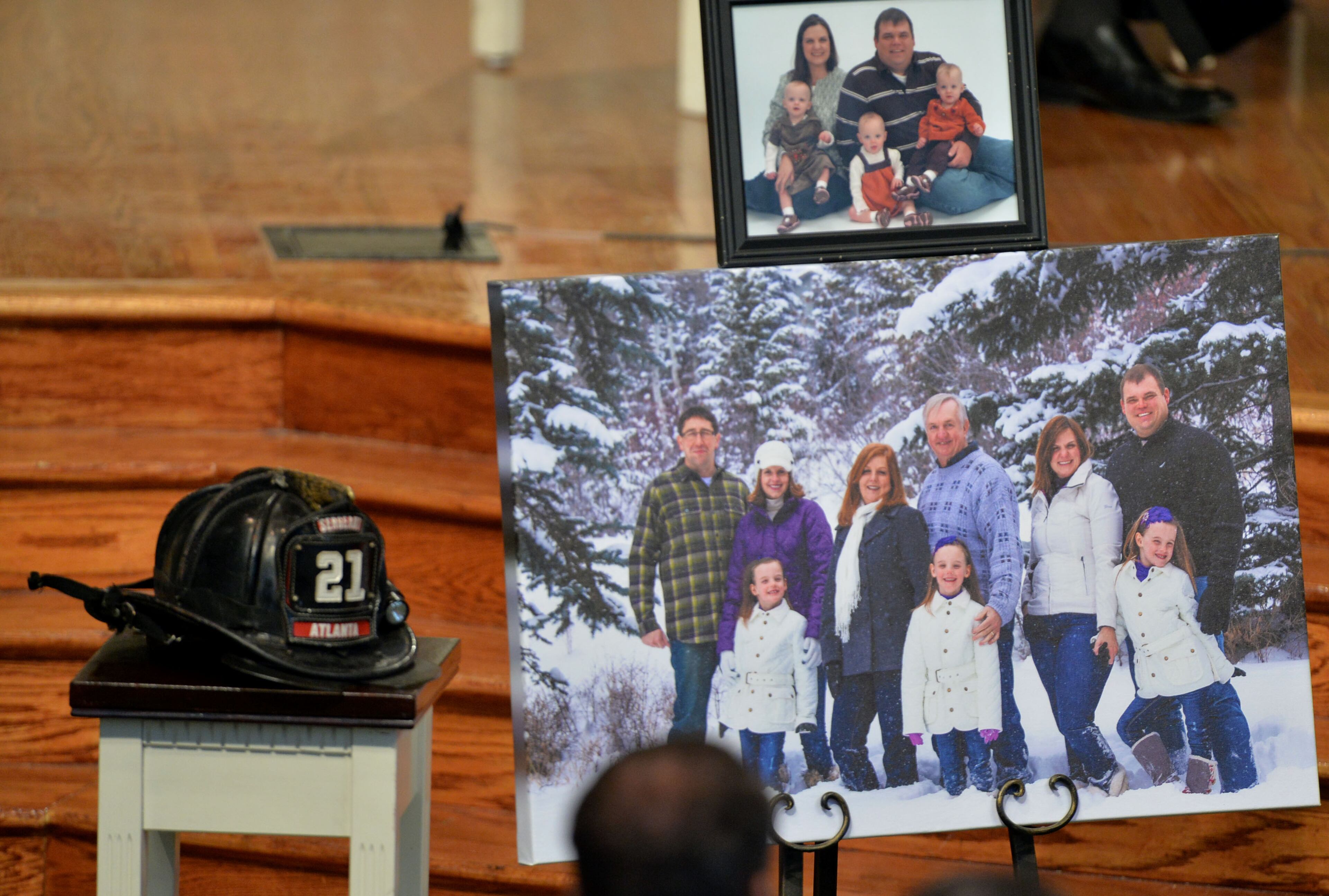 Sgt. Guinn's helmet as well as family photos were on display during the service.