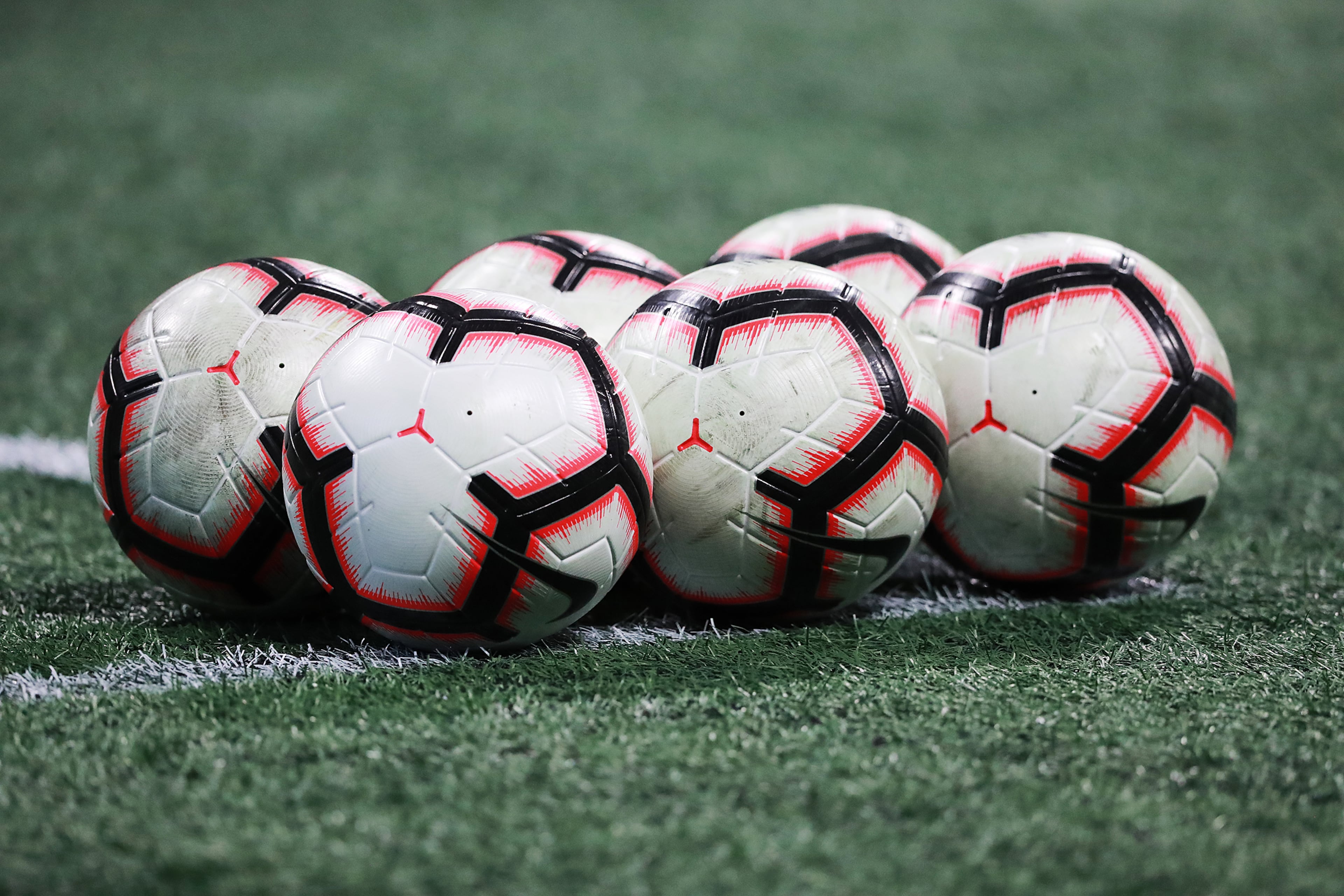 Soccer balls sit on the field before the Concacaf Champions league quarterfinal match. Curtis Compton/ccompton@ajc.com