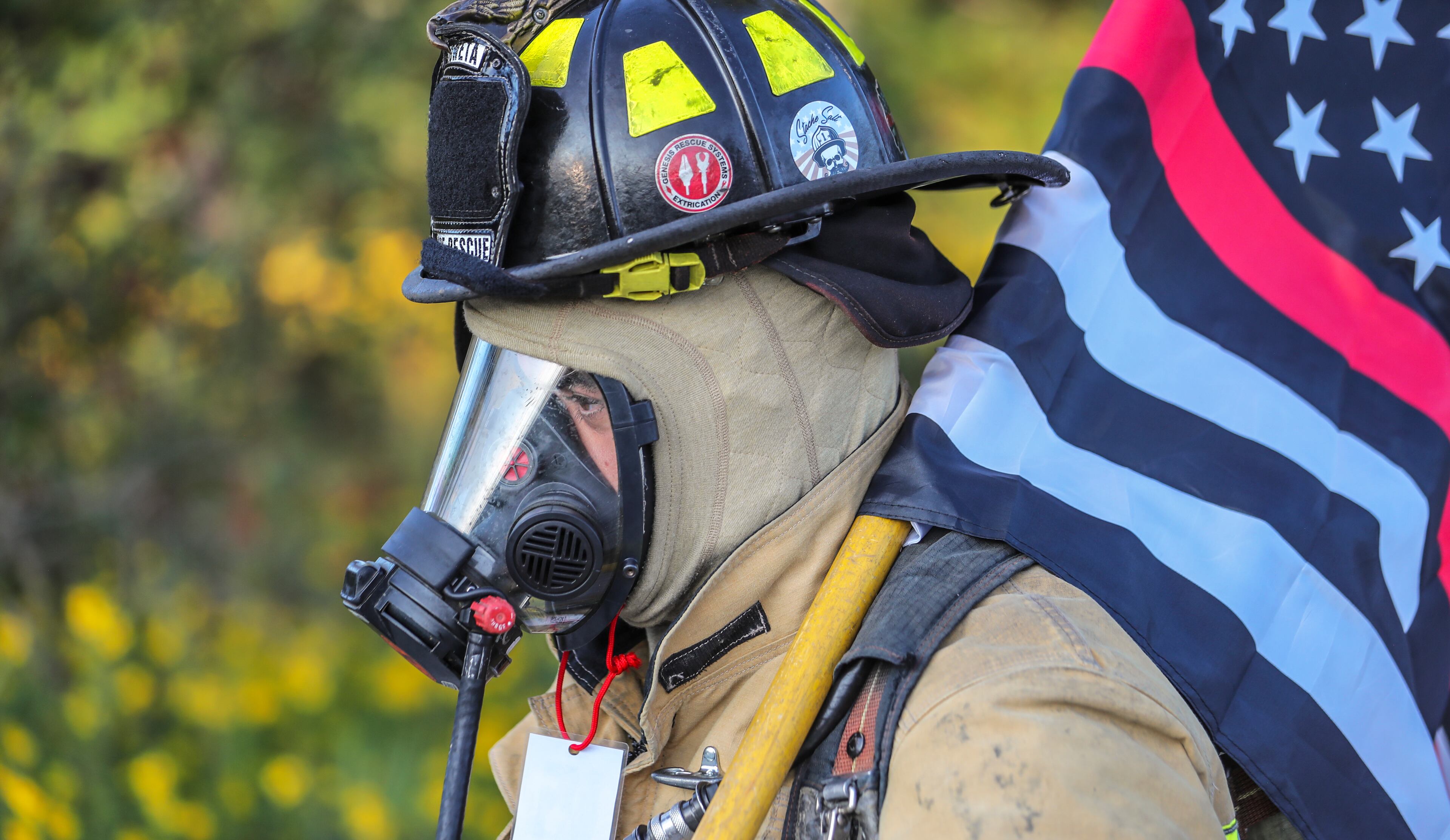 September 11, 2020 Stone Mountain: Cowetta firefighter, Andy Hinesley movs up the mountain. Over 100 firefighters from various metro Atlanta Fire departments including: Fayetteville Fire, Fayetteville Police, Fayette County Fire, Henry County Fire, Spalding County Fire, Union City Fire, Morrow Fire, Barrow County Fire, Johns Creek Fire, Gwinnett County Fire and DeKalb County Fire Rescue ascended Stone Mountain on Friday, Sept. 11, 2020 to commemorate the 19th anniversary of the Sept. 11 attacks on the United States. The 6th annual climb was sponsored by the Fayetteville Fire Department who challenged themselves and fellow firefighters to the one-mile climb, equivalent to 160 flights of stairs. Wearing a full complement of firefighting gear, the group tested their endurance in honor of the sacrifices made by 343 firefighters and paramedics who lost their lives on Sept. 11, 2001. Henry County police joined the group. (John Spink / John.Spink@ajc.com)