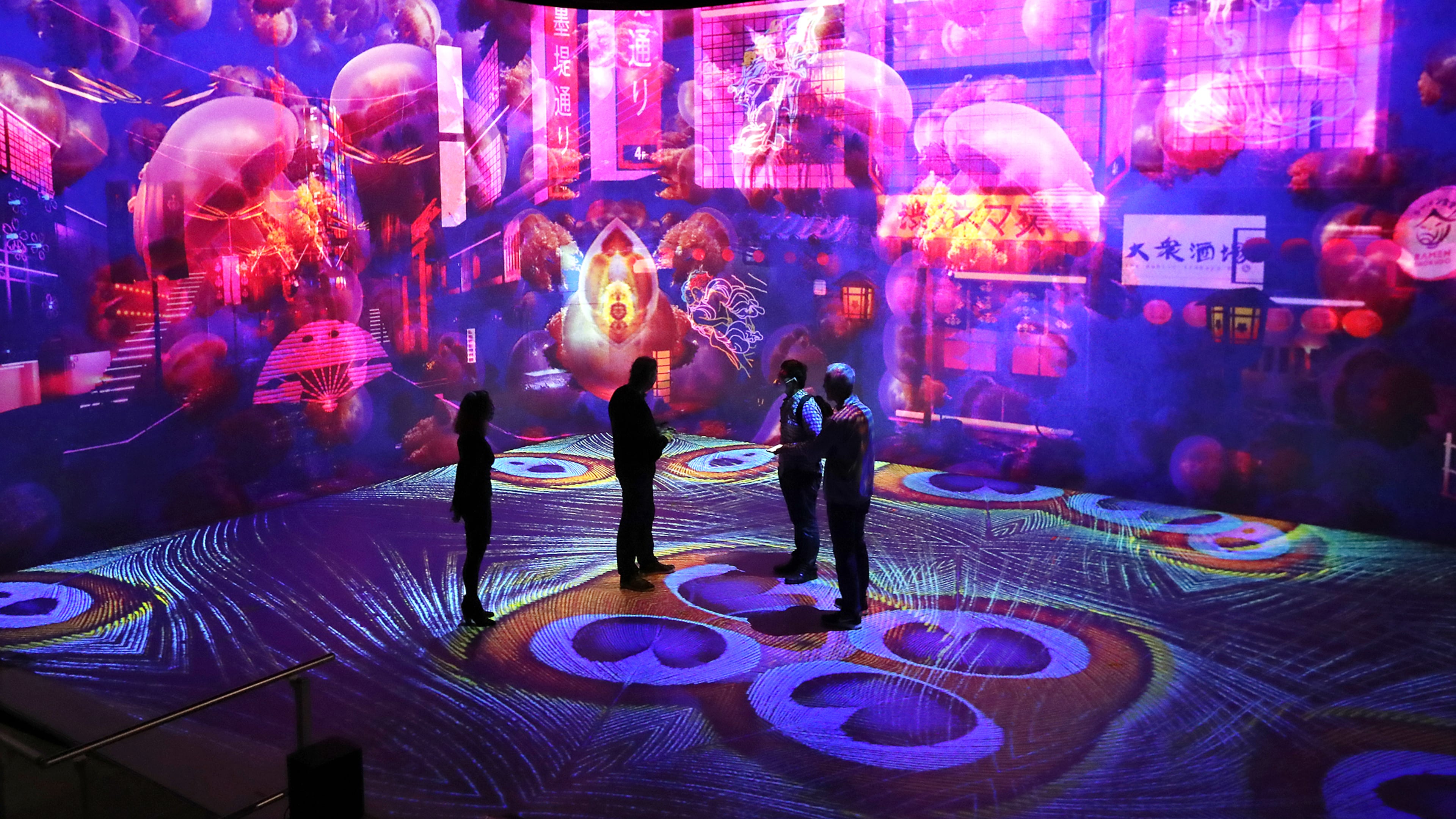 033121 Atlanta: Atlanta entrepreneur Alan Greenberg (second from left) gives visitors a glimpse of Illuminarium, Wednesday, March 31, 2021. “Curtis Compton / Curtis.Compton@ajc.com”