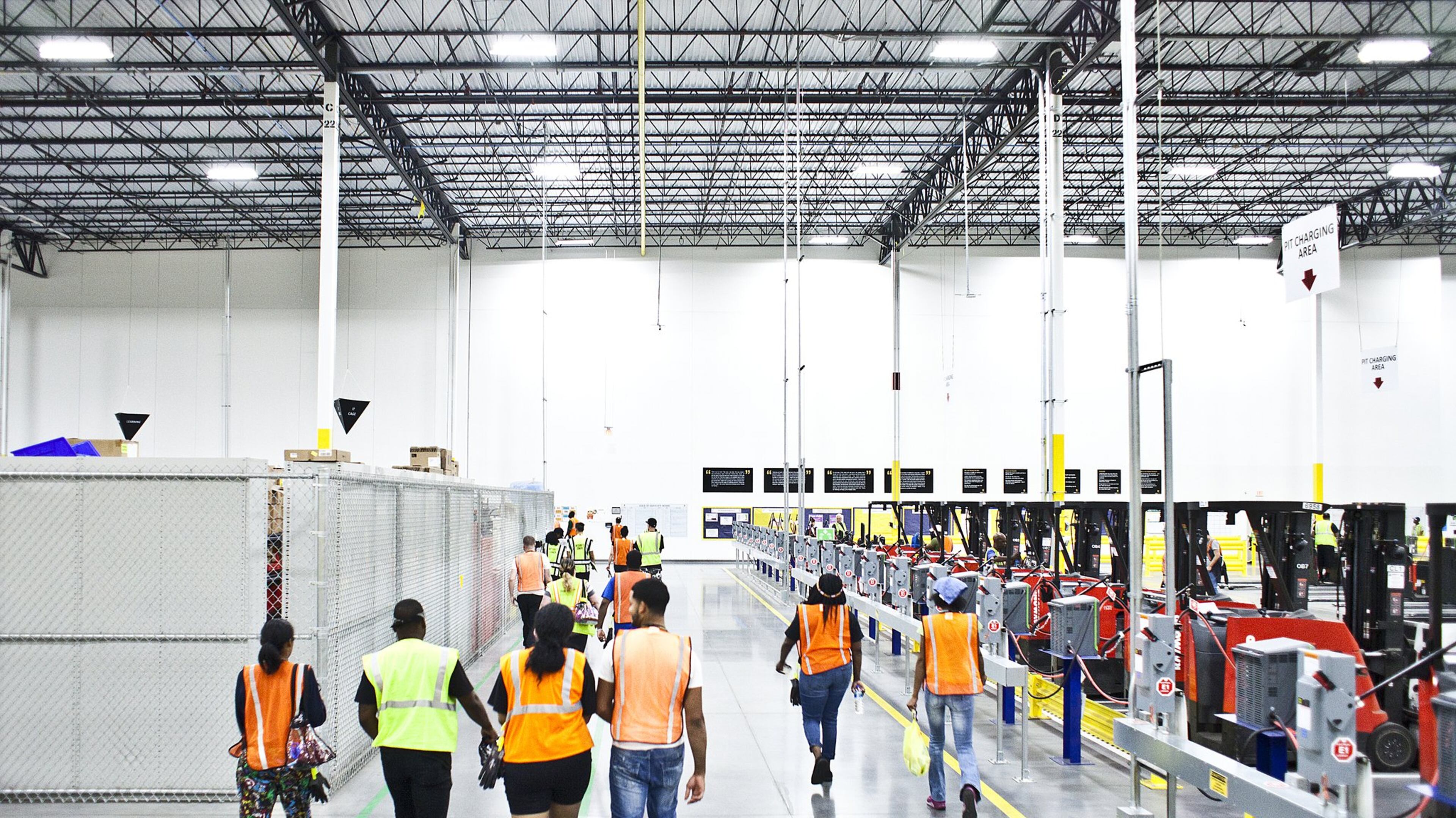 Amazon, Berkshire Hathaway and JPMorgan Chase announced on Jan. 30, 2018, that they would form an independent health care company to serve their employees in the U.S. They gave few details. In this photo, employees are leaving after their shift at an Amazon warehouse in New Jersey. (PHOTO by Bryan Anselm/The New York Times)