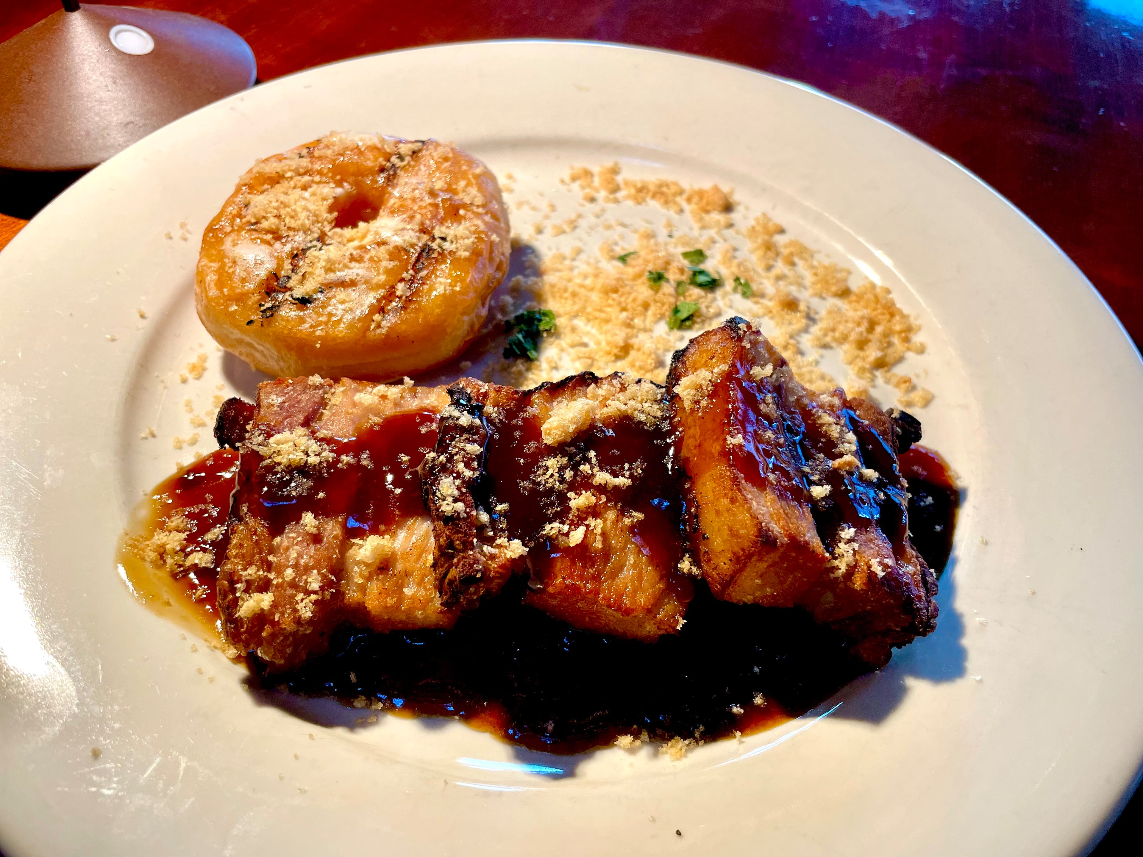The "coffee and doughnuts" pork belly at Terra Terroir was meaty, but so unctuous it felt dessertish. (Angela Hansberger for the AJC)