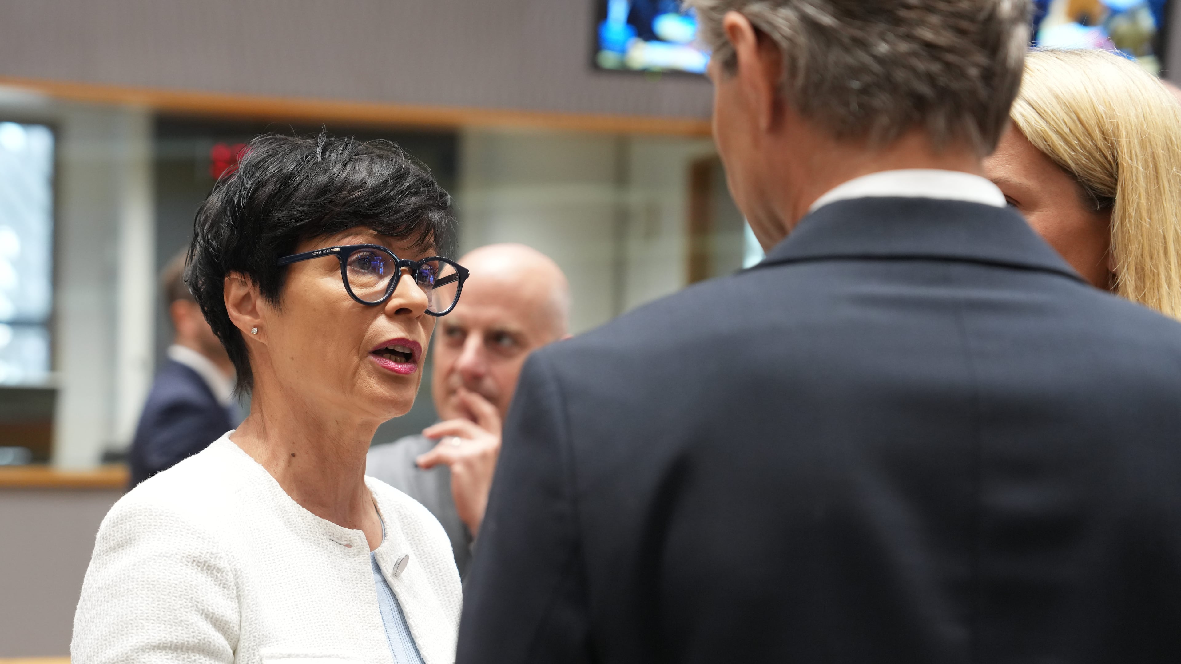 European Commissioner for Enlargement Marta Kos, left, speaks with Lithuania's Foreign Minister Kestutis Budrys, center, and European Union foreign policy chief Kaja Kallas, right, during a round table meeting of EU foreign ministers in Brussels, Monday, July 13, 2026. (AP Photo/Marius Burgelman)