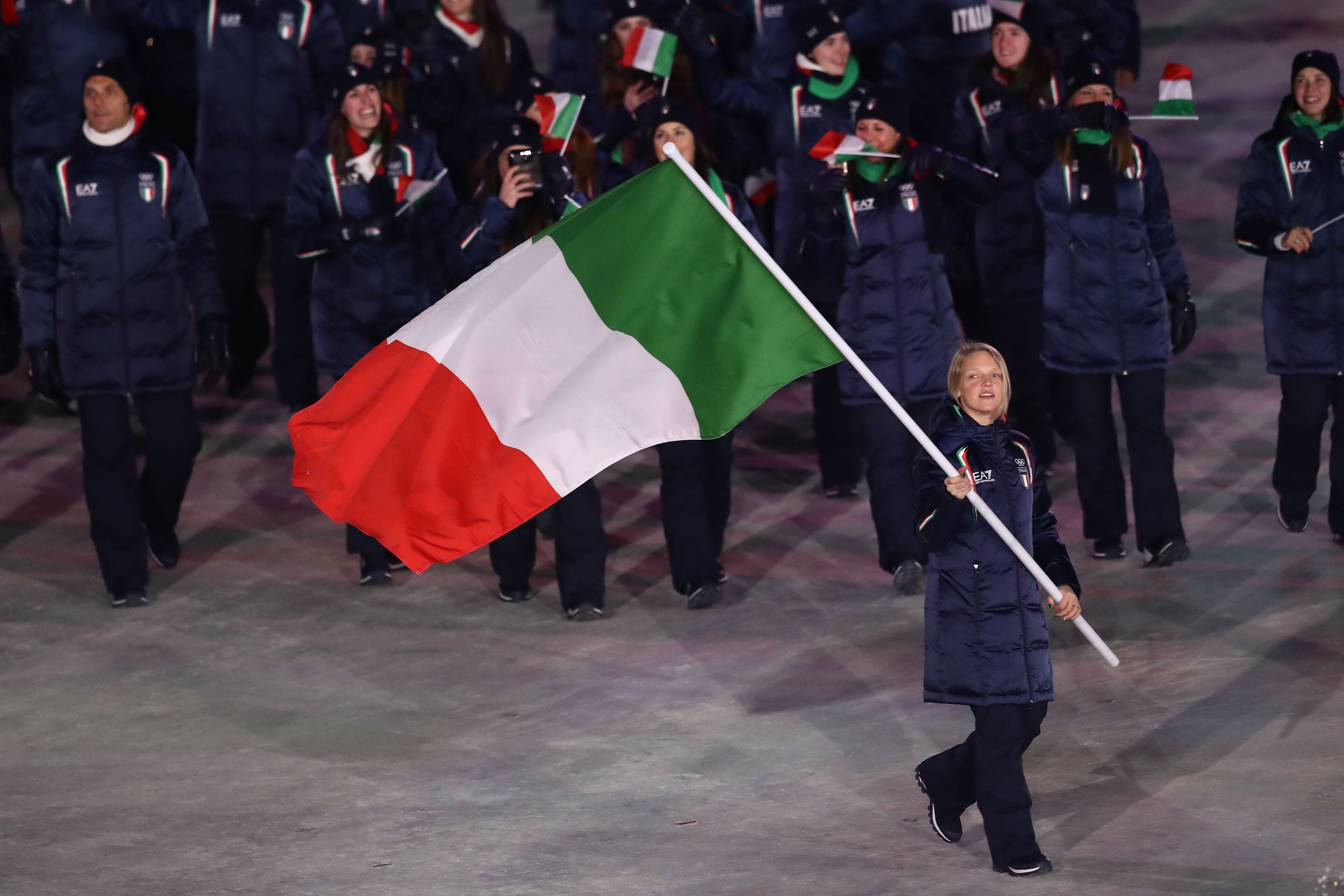 PYEONGCHANG-GUN, SOUTH KOREA - FEBRUARY 09: Flag bearer Arianna Fontana of Italy leads the team during the Opening Ceremony of the PyeongChang 2018 Winter Olympic Games at PyeongChang Olympic Stadium on February 9, 2018 in Pyeongchang-gun, South Korea. (Photo by Ronald Martinez/Getty Images)