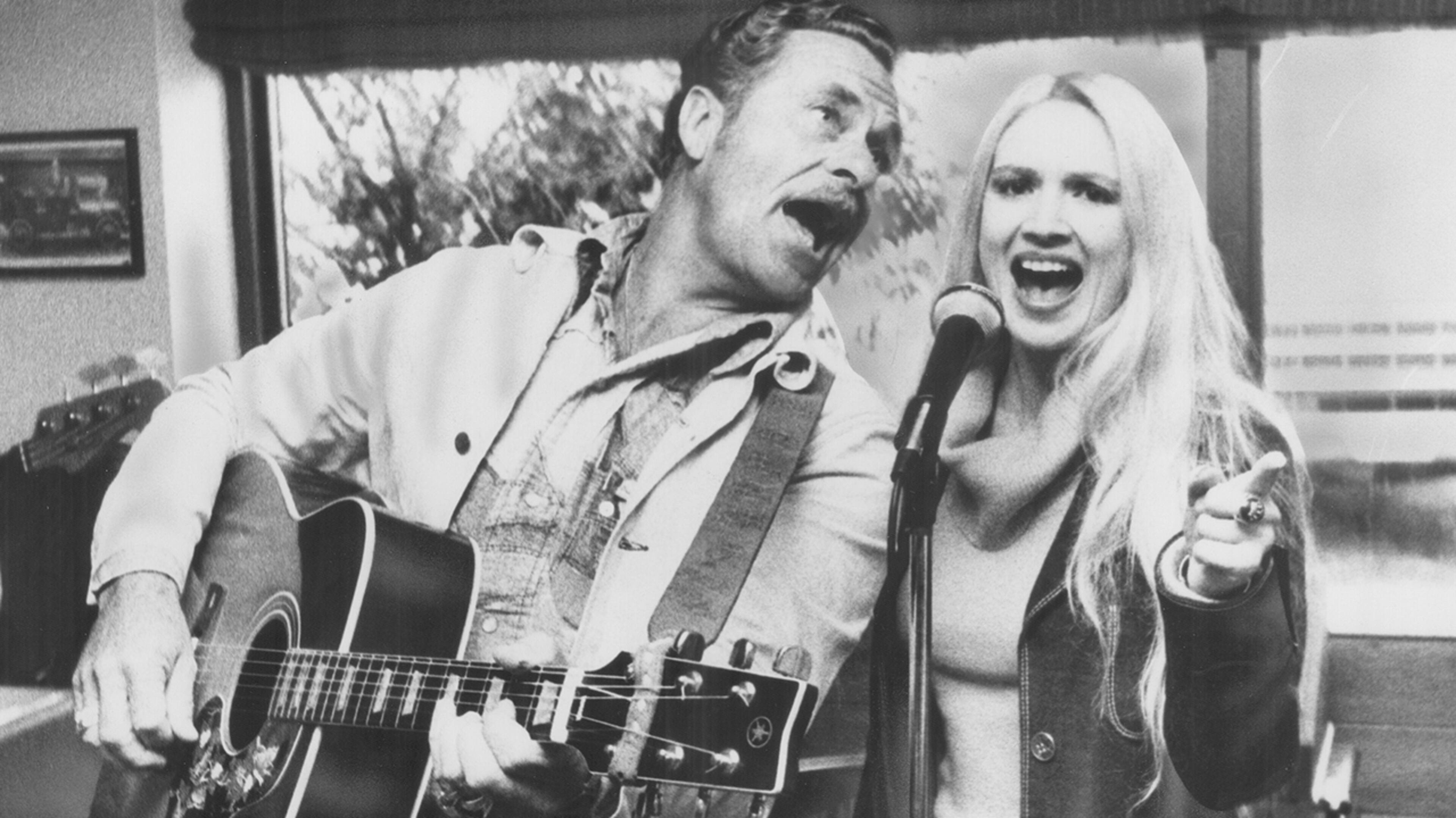 CANADA - SEPTEMBER 21: Singing out for travellers. Gordie Tapp and Robin Yancey performed for truckers who pulled their rigs into the Fifth Wheel on Highway 25 south of Highway 401 at Milton yesterday. International Harvester organized a truckers' jamboree with performances at the restaurant - Canada's biggest truck stop - by some of the country's best country and western artists. (Photo by Brian Dexter/Toronto Star via Getty Images)