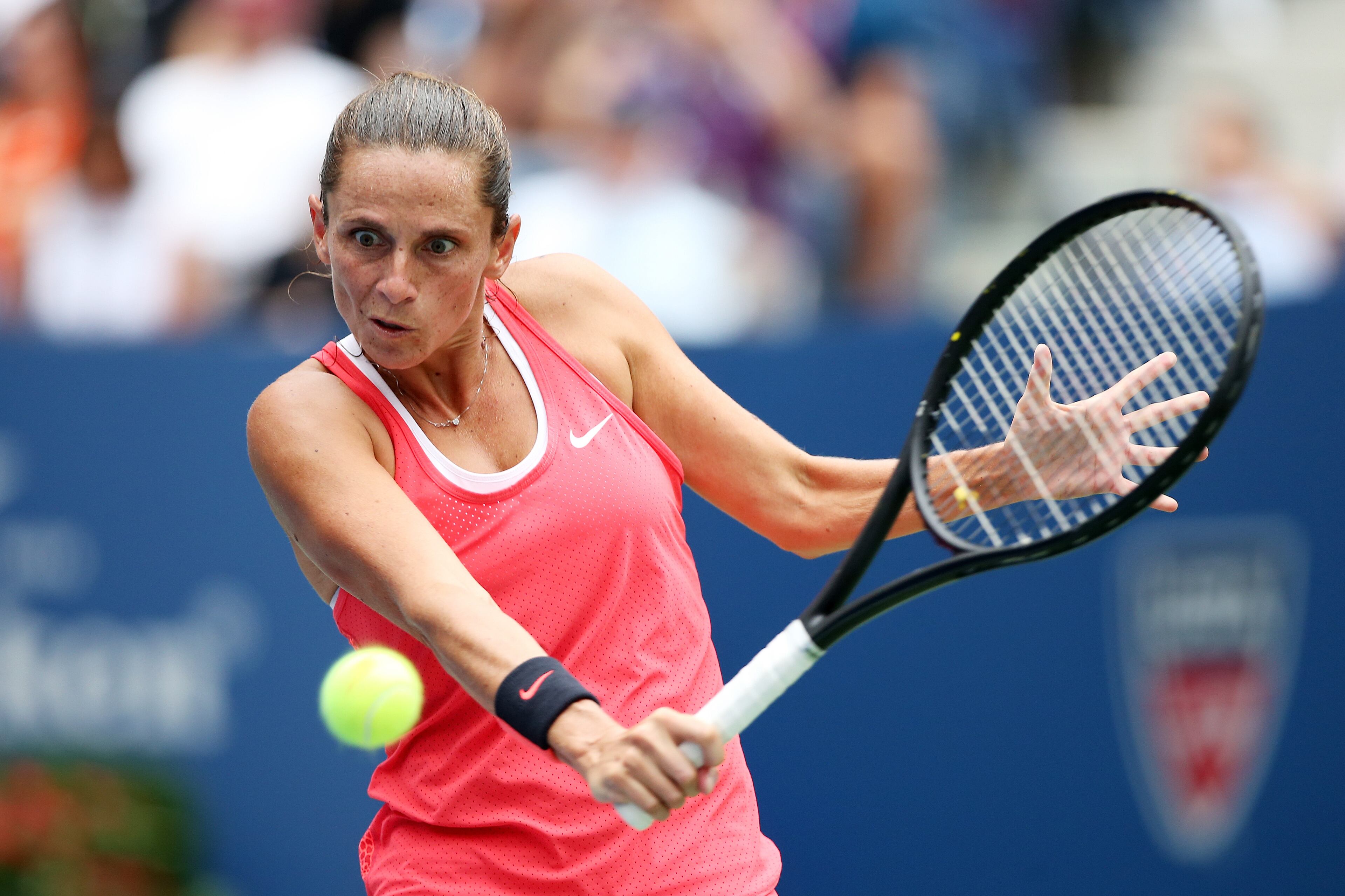 NEW YORK, NY - SEPTEMBER 12: Roberta Vinci of Italy returns a backhand shot to Flavia Pennetta of Italy during their Women's Singles Final match on Day Thirteen of the 2015 US Open at the USTA Billie Jean King National Tennis Center on September 12, 2015 in the Flushing neighborhood of the Queens borough of New York City. (Photo by Matthew Stockman/Getty Images)