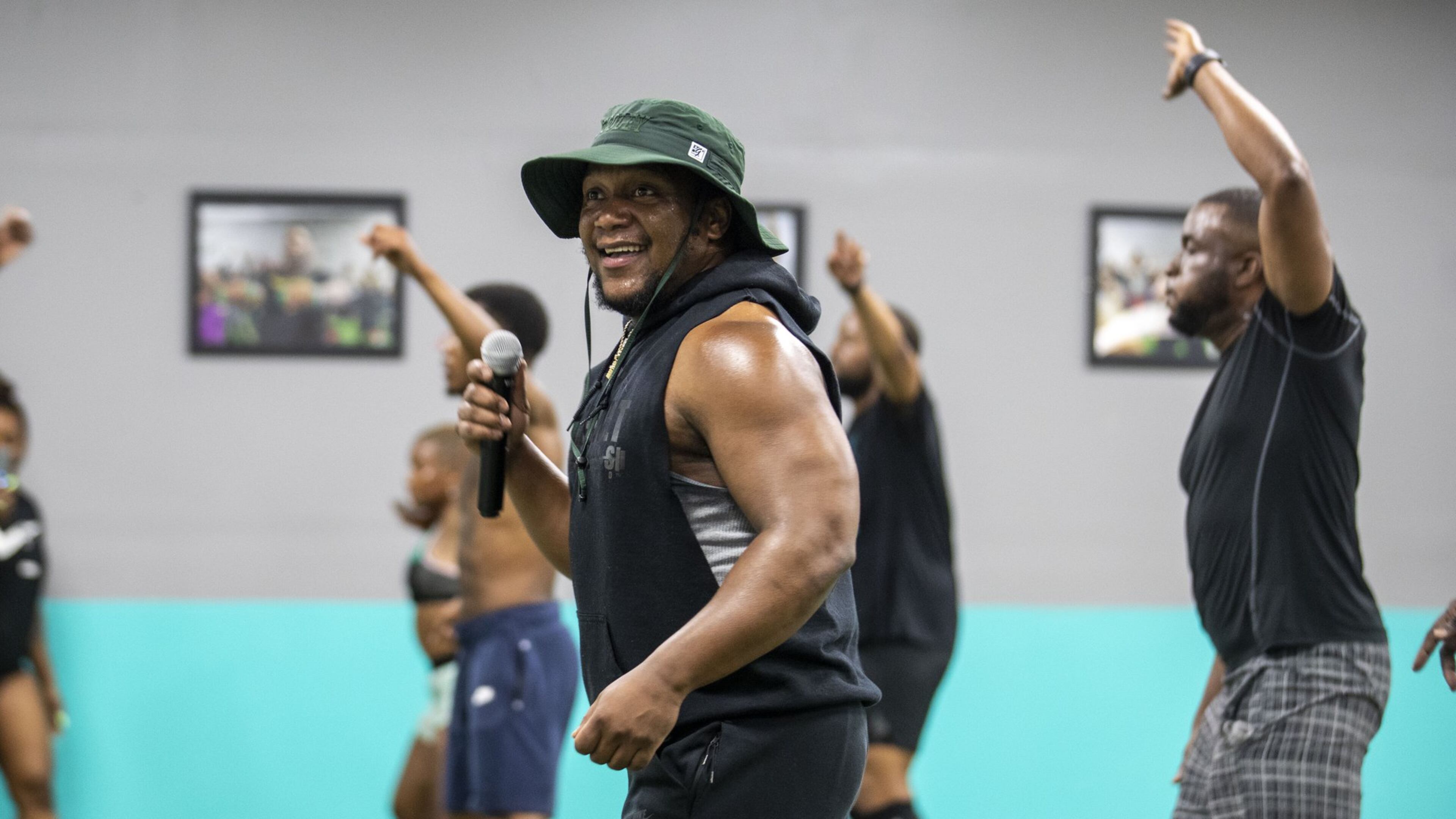 Kendrick “Dooley” Loucious (right), fitness trainer and founder of E.F.F.E.C.T. Fitness, teaches a class at the gym in Atlanta’s Sylvan Hills community, Friday, June 12, 2020. Photo: ALYSSA POINTER / ALYSSA.POINTER@AJC.COM