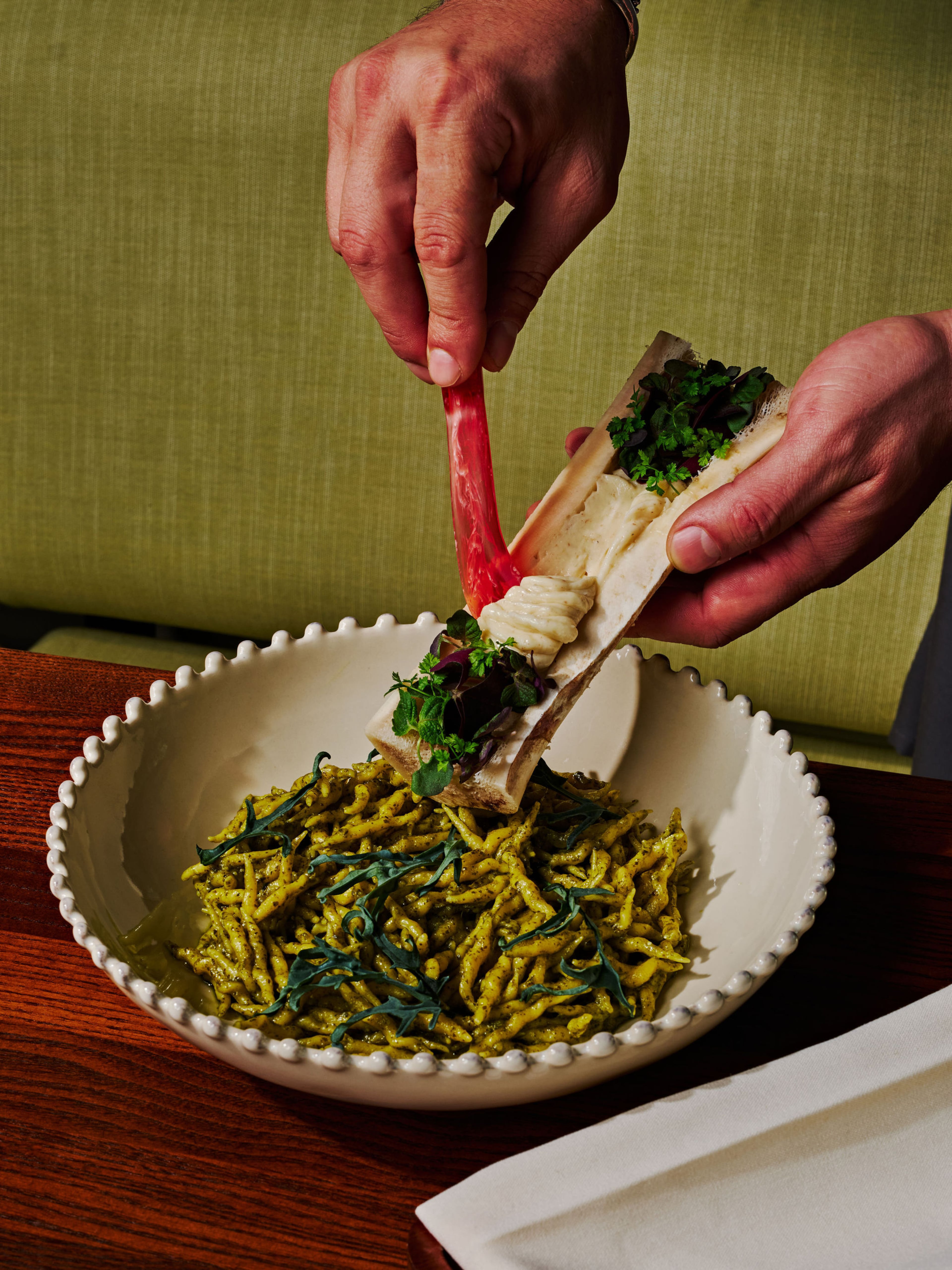 The short, twisty noodles in the seldom-seen trofie pasta at Füm is finished with a rich dollop of marrow butter. (Courtesy of Füm)