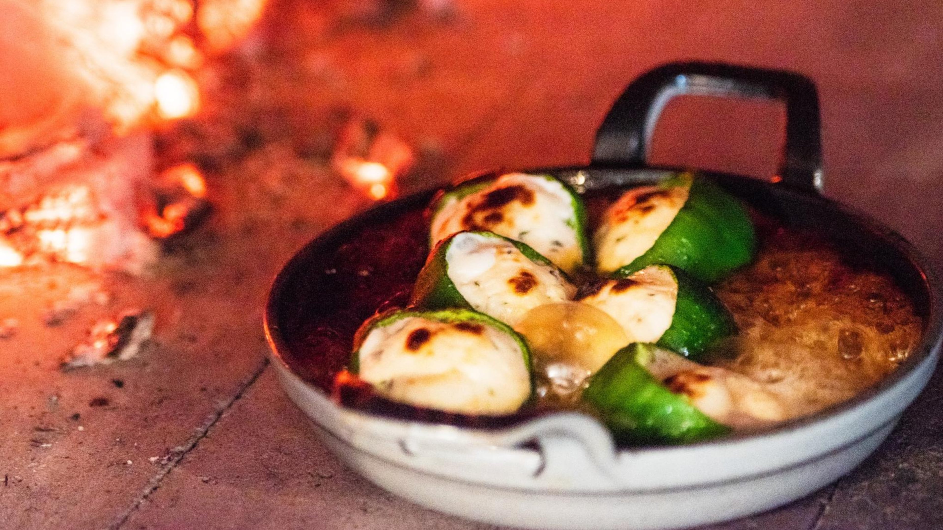 Stuffed Baby Bell Peppers with Goat Cheese & Fennel Pollen-Infused Honey at Brezza Cucina in Ponce City Market. CONTRIBUTED BY HENRI HOLLIS