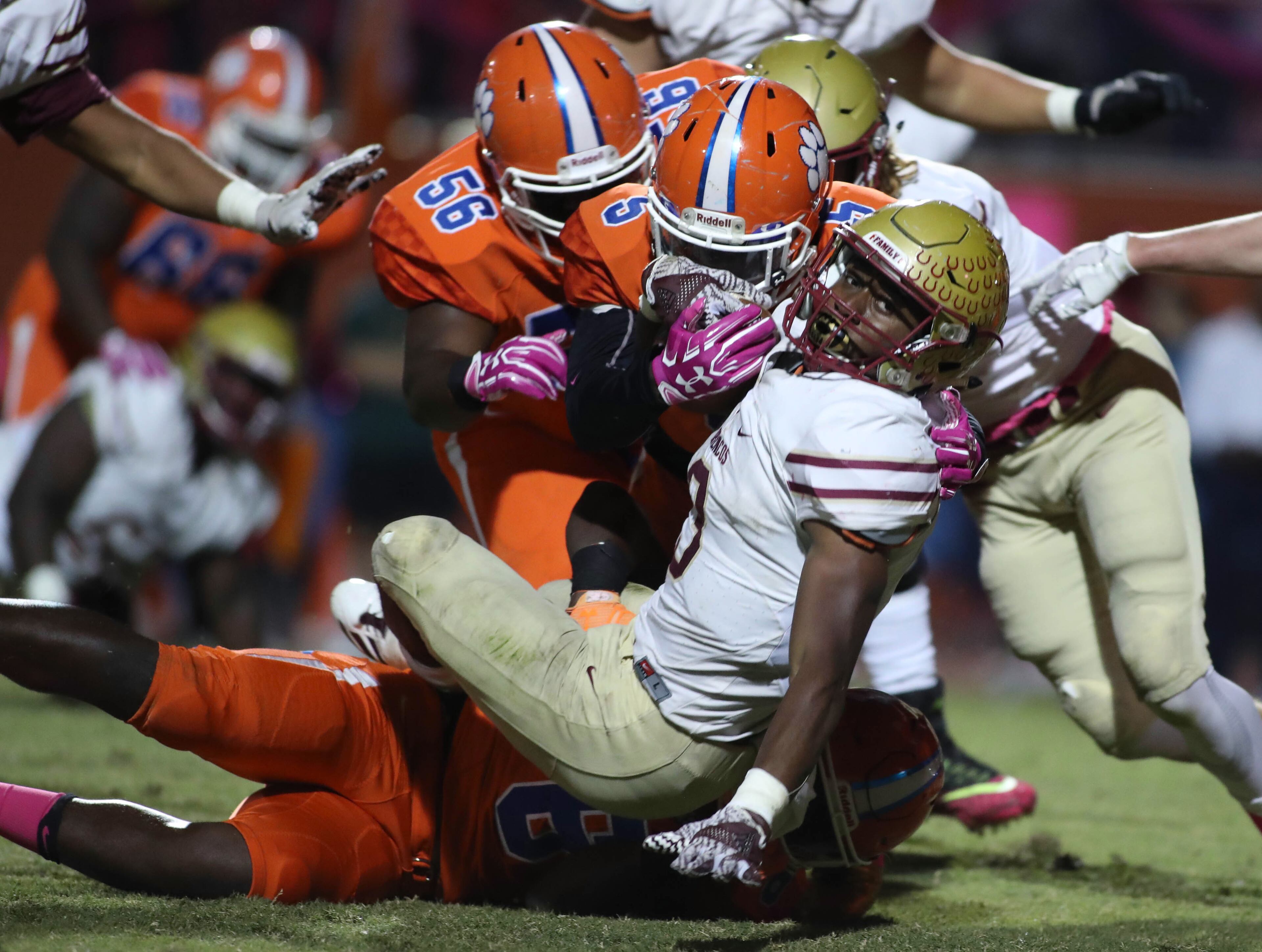 October 20, 2017 - Lilburn, Ga: Brookwood running back Dante Black (3) fights for yards against Parkview defenders in the first half of their game at Parkview High School Friday, October 20, 2017, in Lilburn, Ga.. PHOTO / JASON GETZ