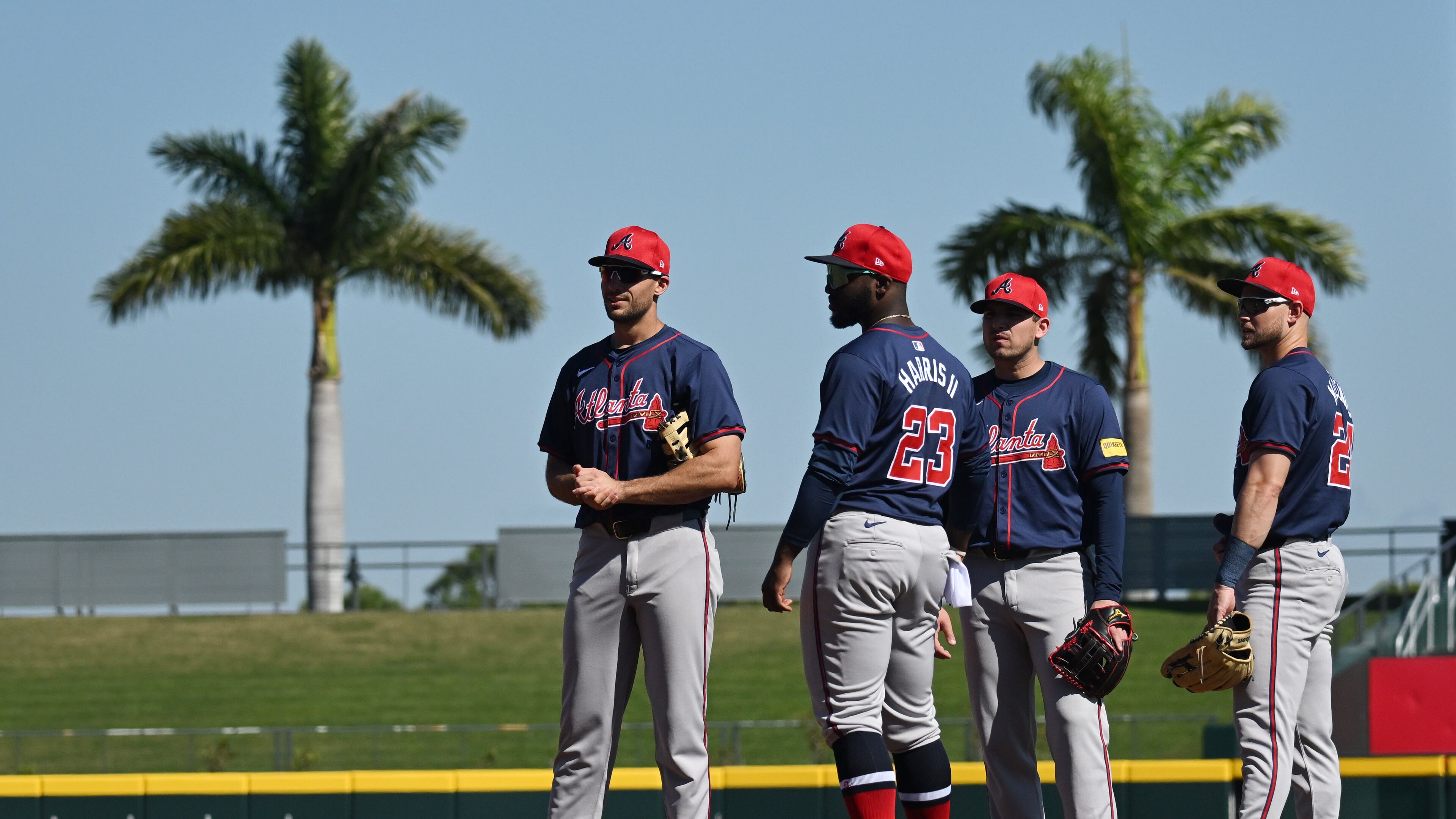 Atlanta Braves first baseman Matt Olson (from left), center fielder Michael Harris II, third baseman Austin Riley and left fielder Jarred Kelenic chat during spring training workouts at CoolToday Park, Friday, Feb. 23, 2024, in North Port, Florida. (Hyosub Shin / Hyosub.Shin@ajc.com)