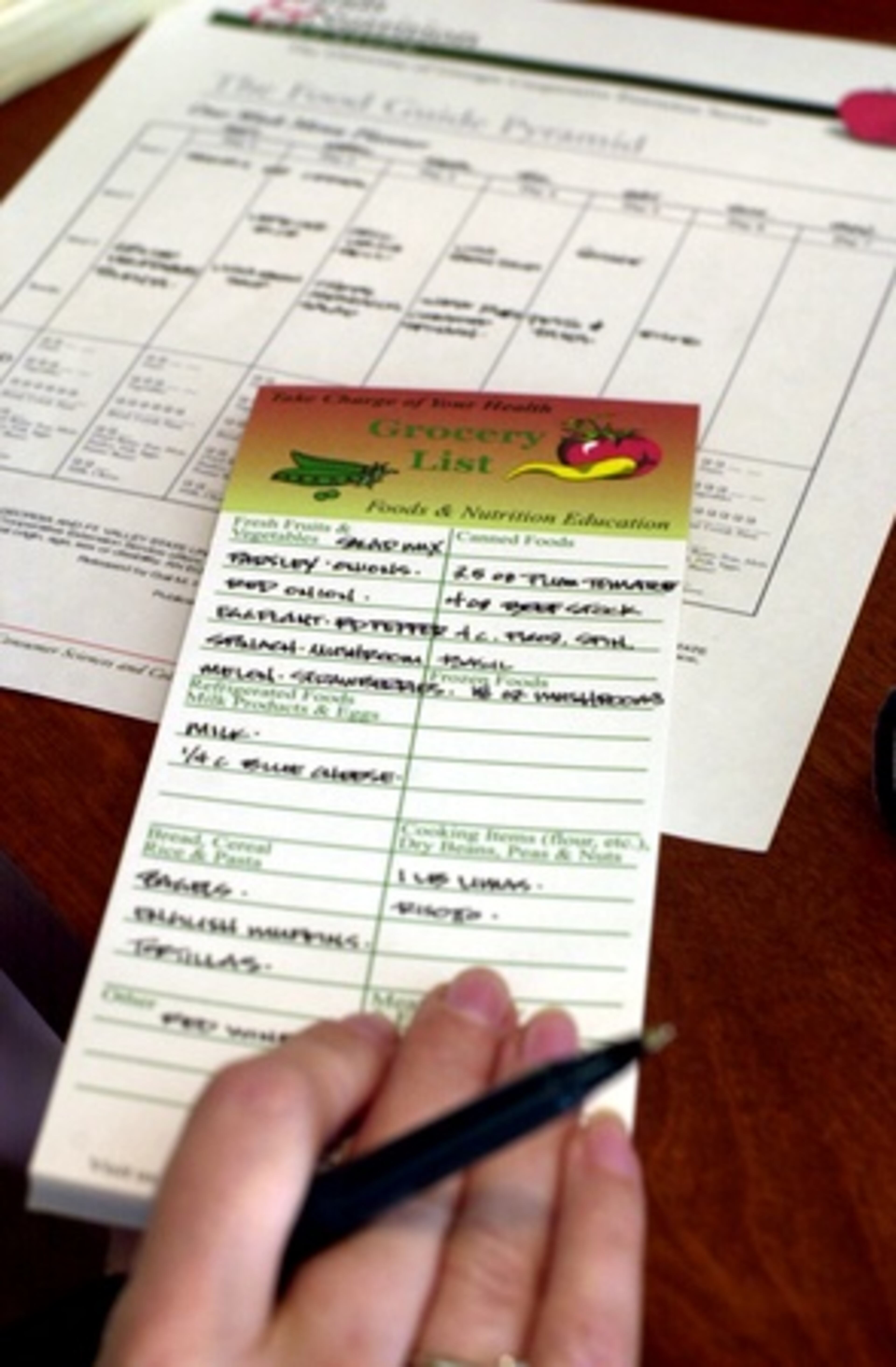 Make a weekly menu plan and shopping list, and stick to it. Switch to a cash-only budget. Set spending amounts for groceries, eating out, and miscellaneous household purchases (light bulbs, cat food). Allot yourself a small amount of fun money for coffee dates, etc. Then put cash in separate envelopes for each category. Don't lose the envelopes.