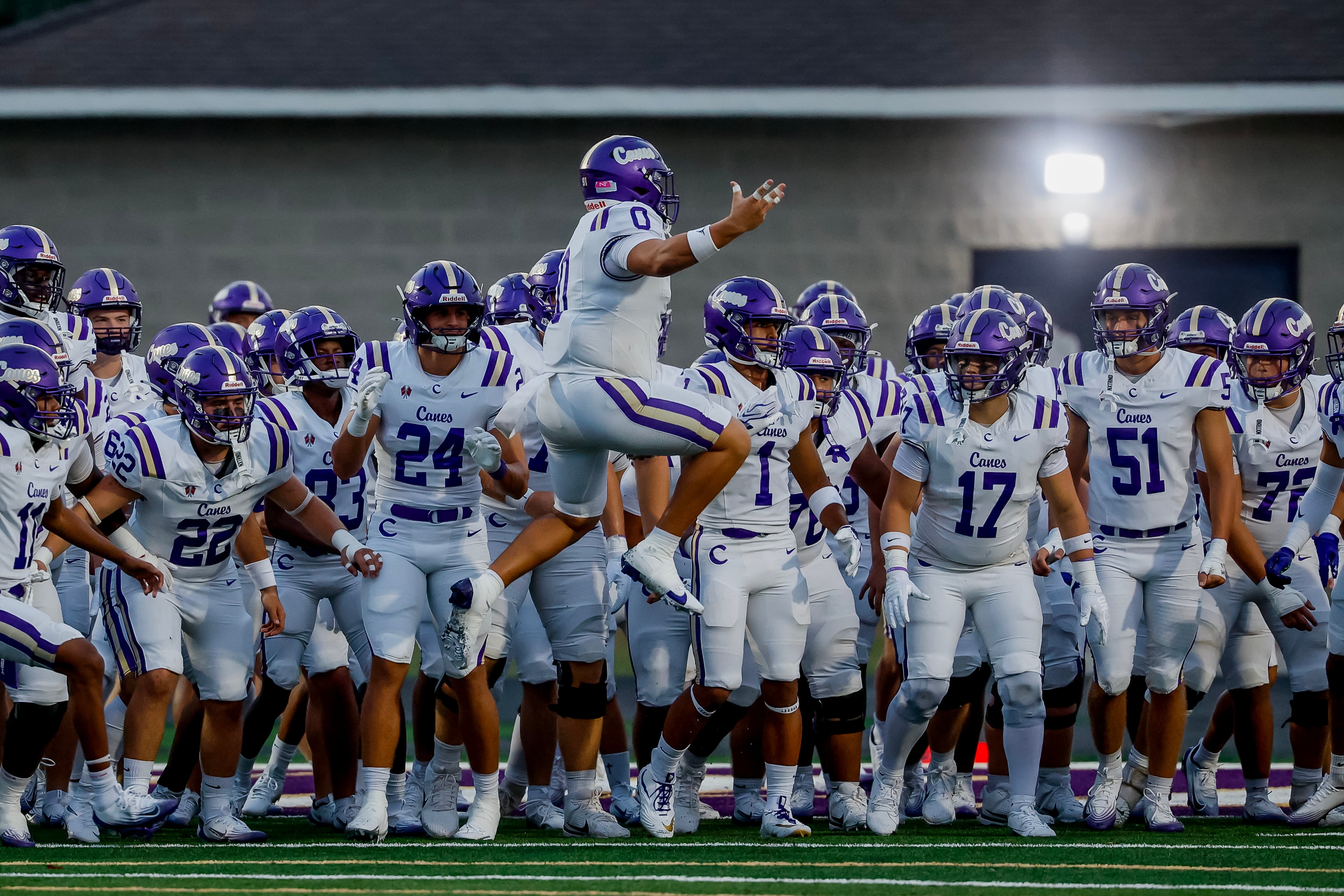 Cartersville defensive lineman Grayson Villar leads his teammates onto the field before their game between Hiram on Friday, Aug. 21, 2026, in Hiram. (Erik S. Lesser for the AJC)