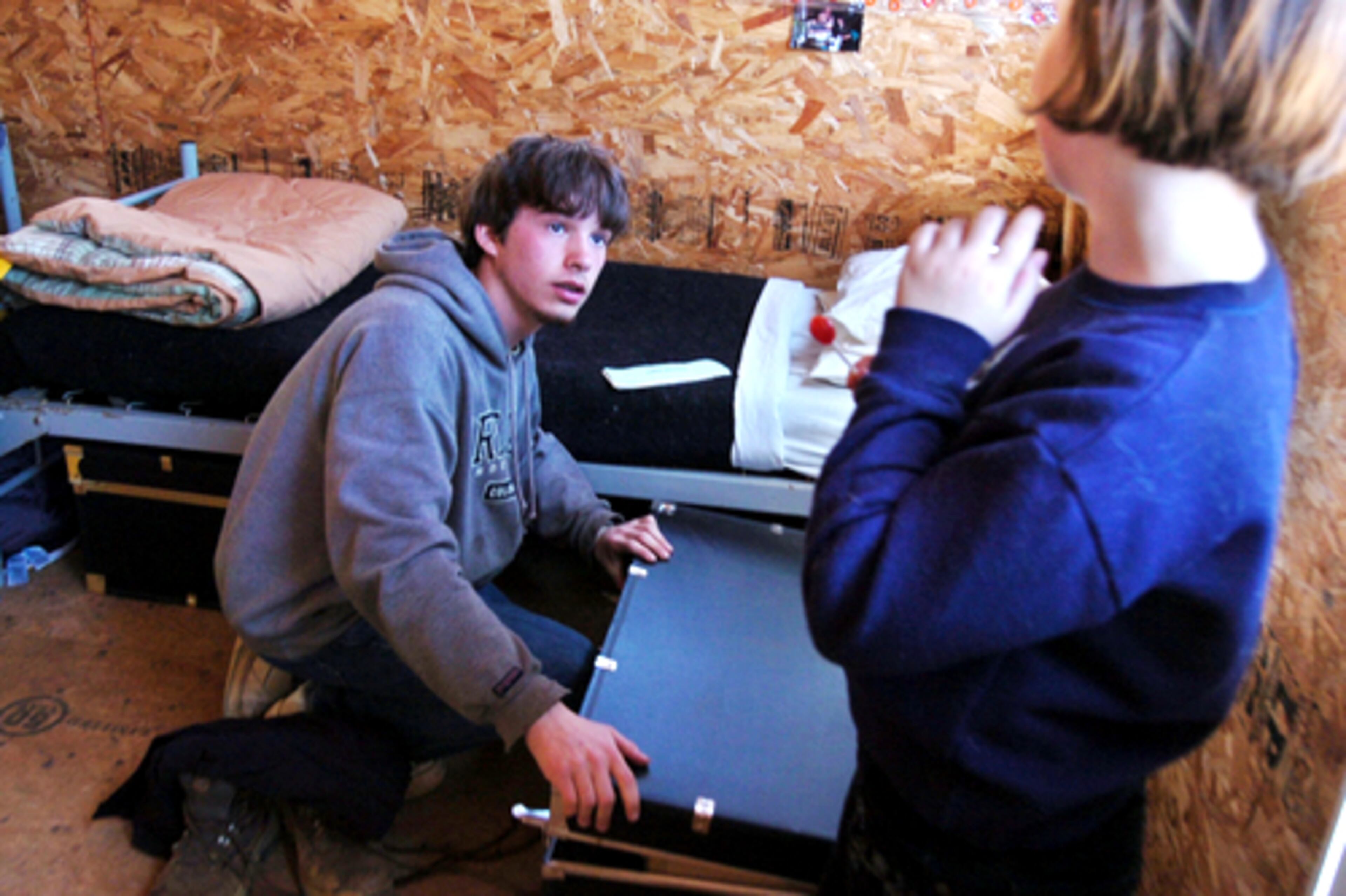 Andrew Sherman from Acworth grabs some last-minute items as sister watches. His parents placed him there after he frequently skipped classes at Kell High School, lost his drivers license, briefly ran away from home and dabbled with illegal drugs.