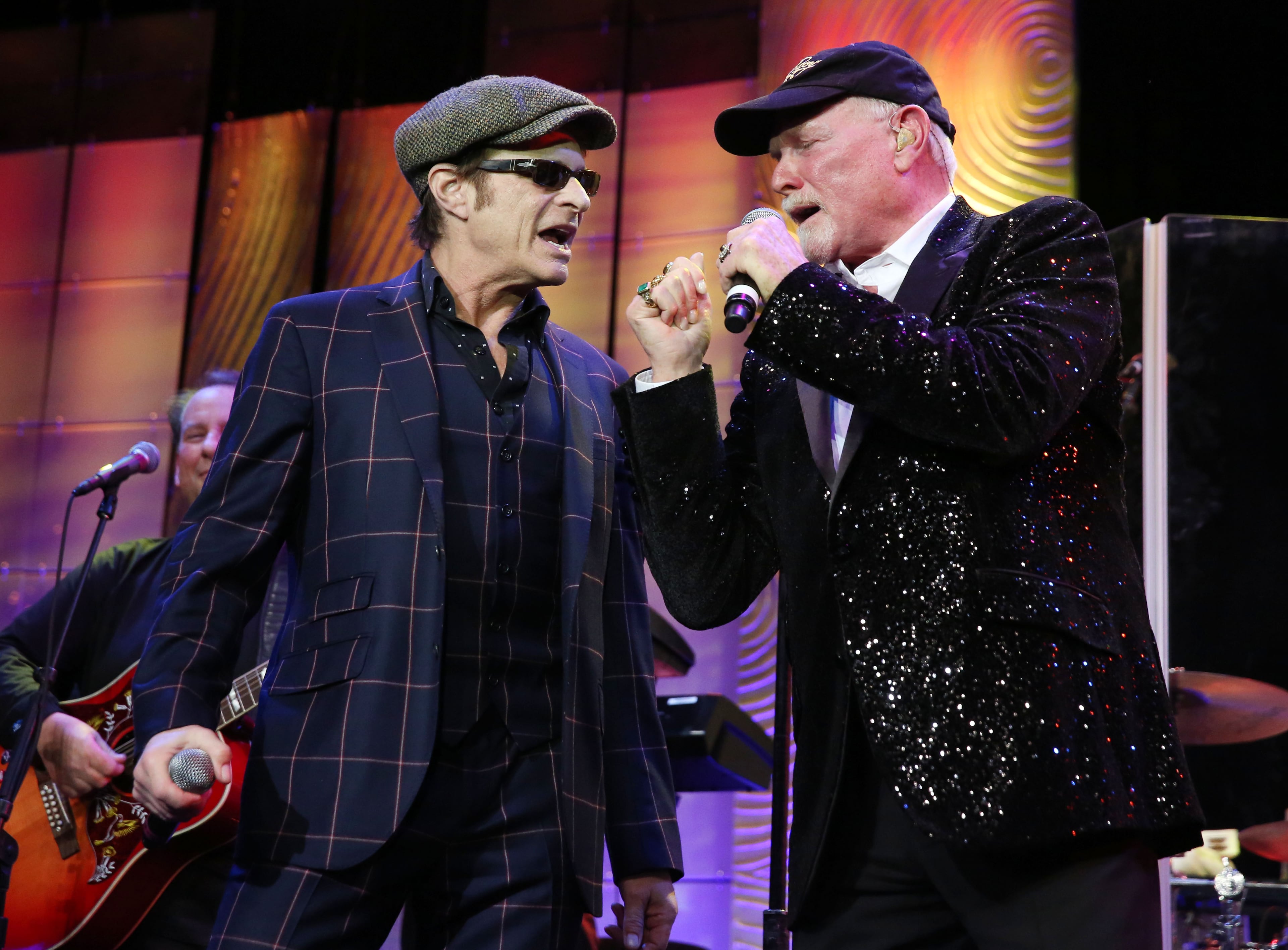 David Lee Roth, left, and Mike Love perform at The Society of Singers' 21st ELLA Awards on Thursday, Feb. 20, 2014 in Beverly Hills, Calif. The event honored Mike Love, lead singer and co-founder of The Beach Boys, producer Nigel Lythgoe, and backup singers The Waters Family. (Photo by Matt Sayles/Invision for The Society of Singers/AP Images)