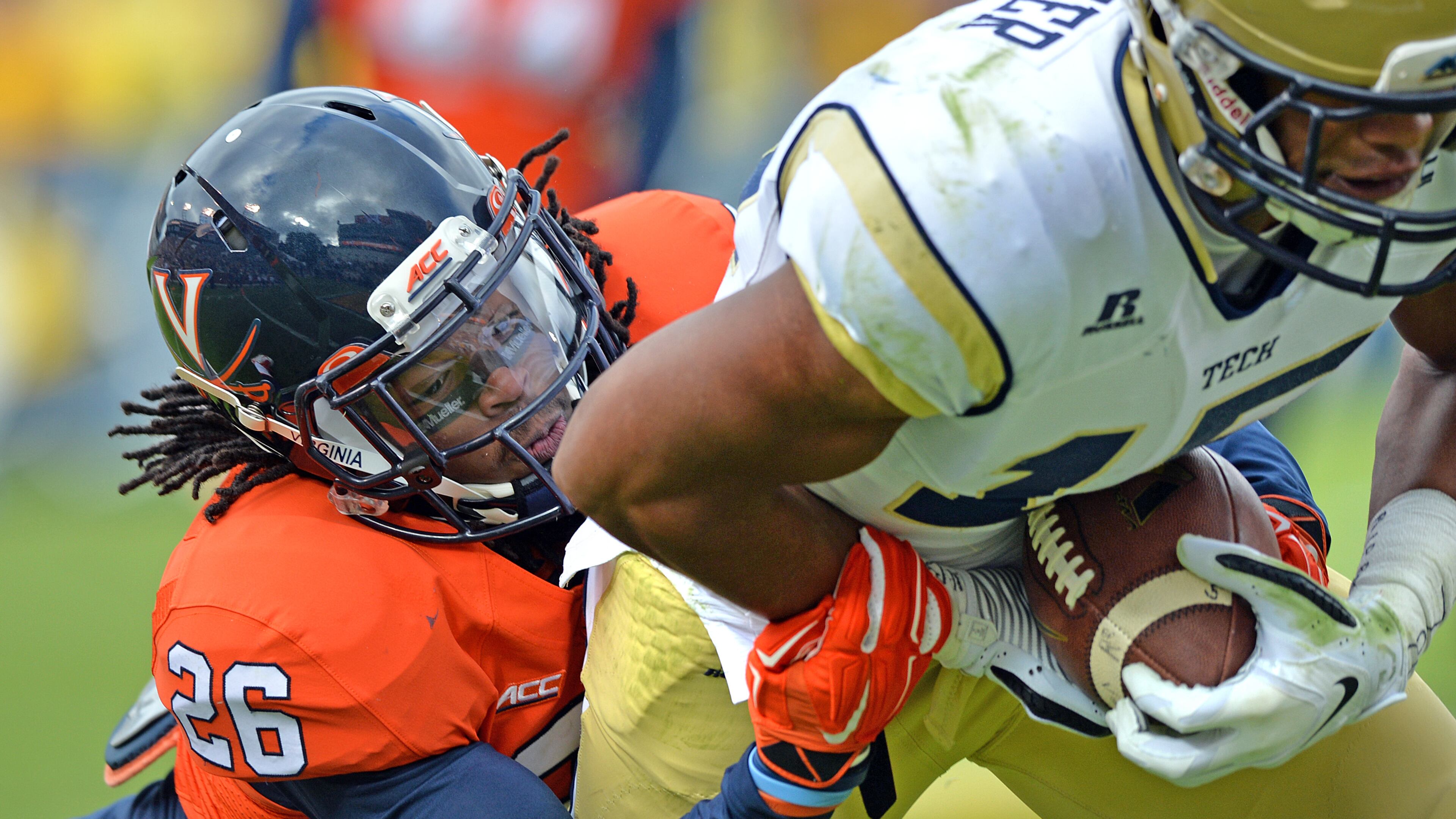 Georgia Tech Yellow Jackets wide receiver DeAndre Smelter (15) breaks away from Virginia Cavaliers cornerback Maurice Canady (26) for a touchdown in the first half at Bobby Dodd Stadium on Saturday, November 1, 2014. HYOSUB SHIN / HSHIN@AJC.COM