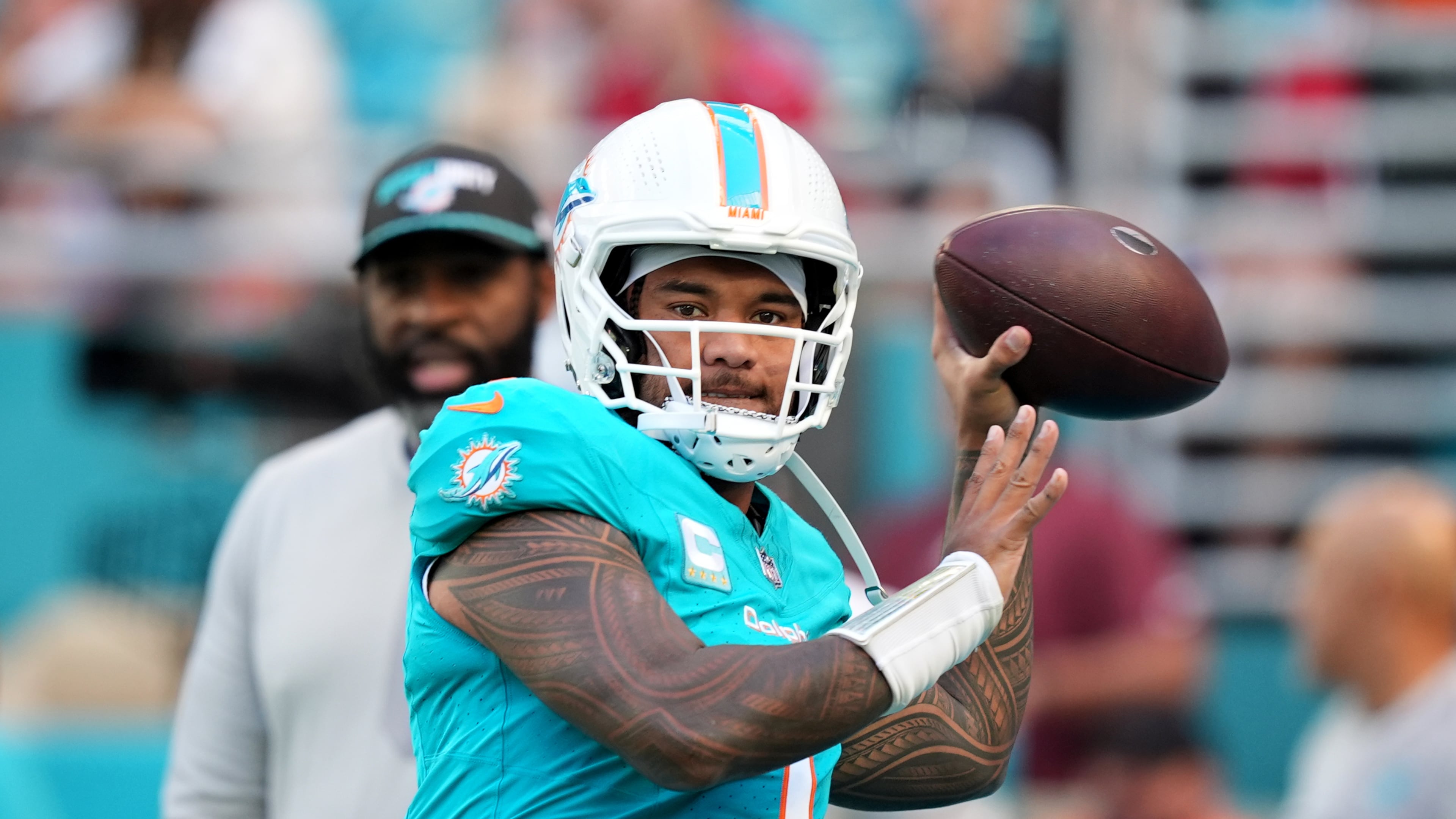 Miami Dolphins quarterback Tua Tagovailoa warms up before an NFL football game against the Tampa Bay Buccaneers Sunday, Dec. 28, 2025, in Miami Gardens, Fla. (Rebecca Blackwell/AP)