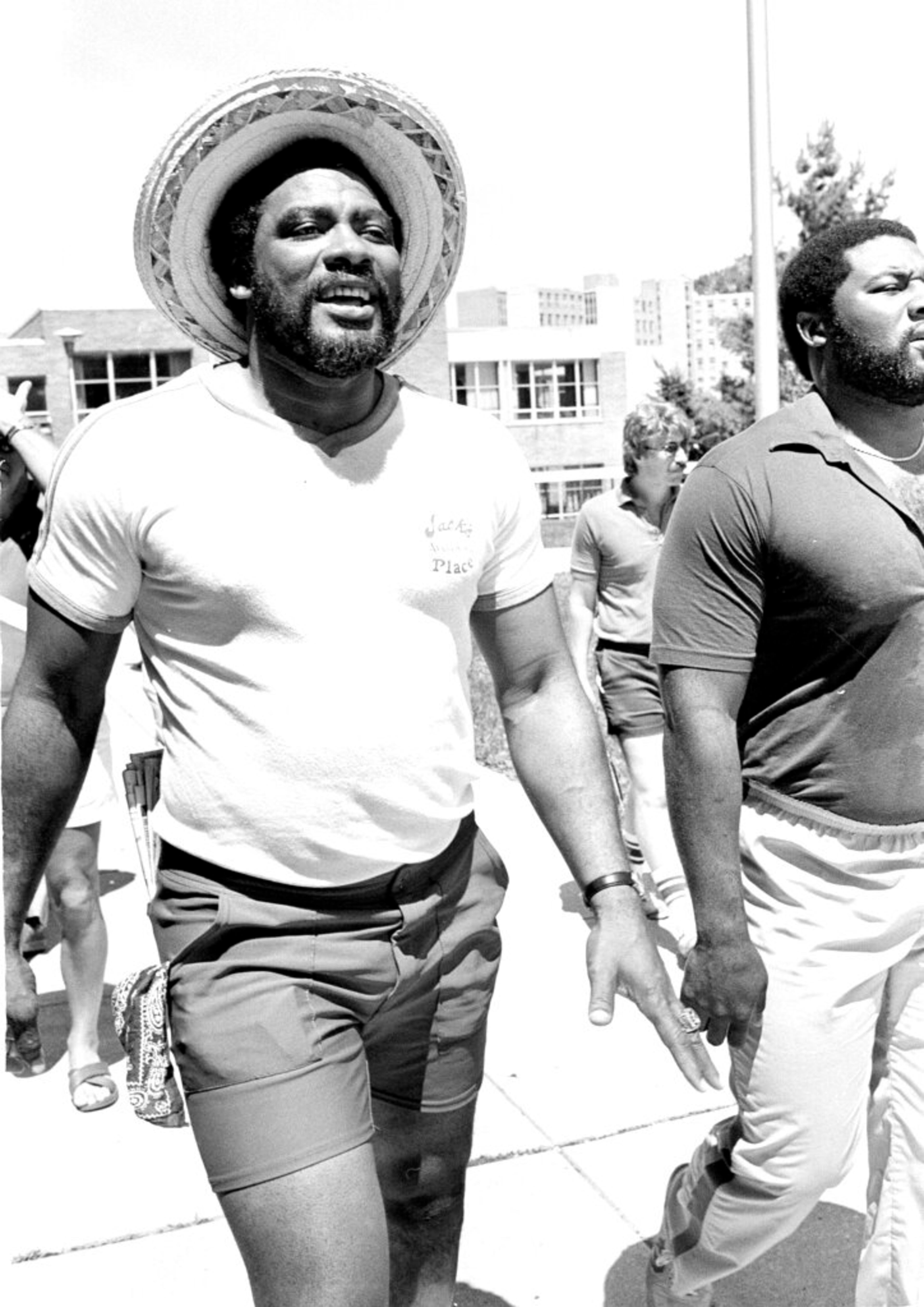 Philadelphia Eagles veteran defensive end Claude Humphrey relaxes beneath a straw hat after announcing his retirement from the team at West Chester, Penn., July 29, 1982. Humphrey said he was quitting because of damaged knee cartilage that would not heal. (AP Photo/Peter Morgan)