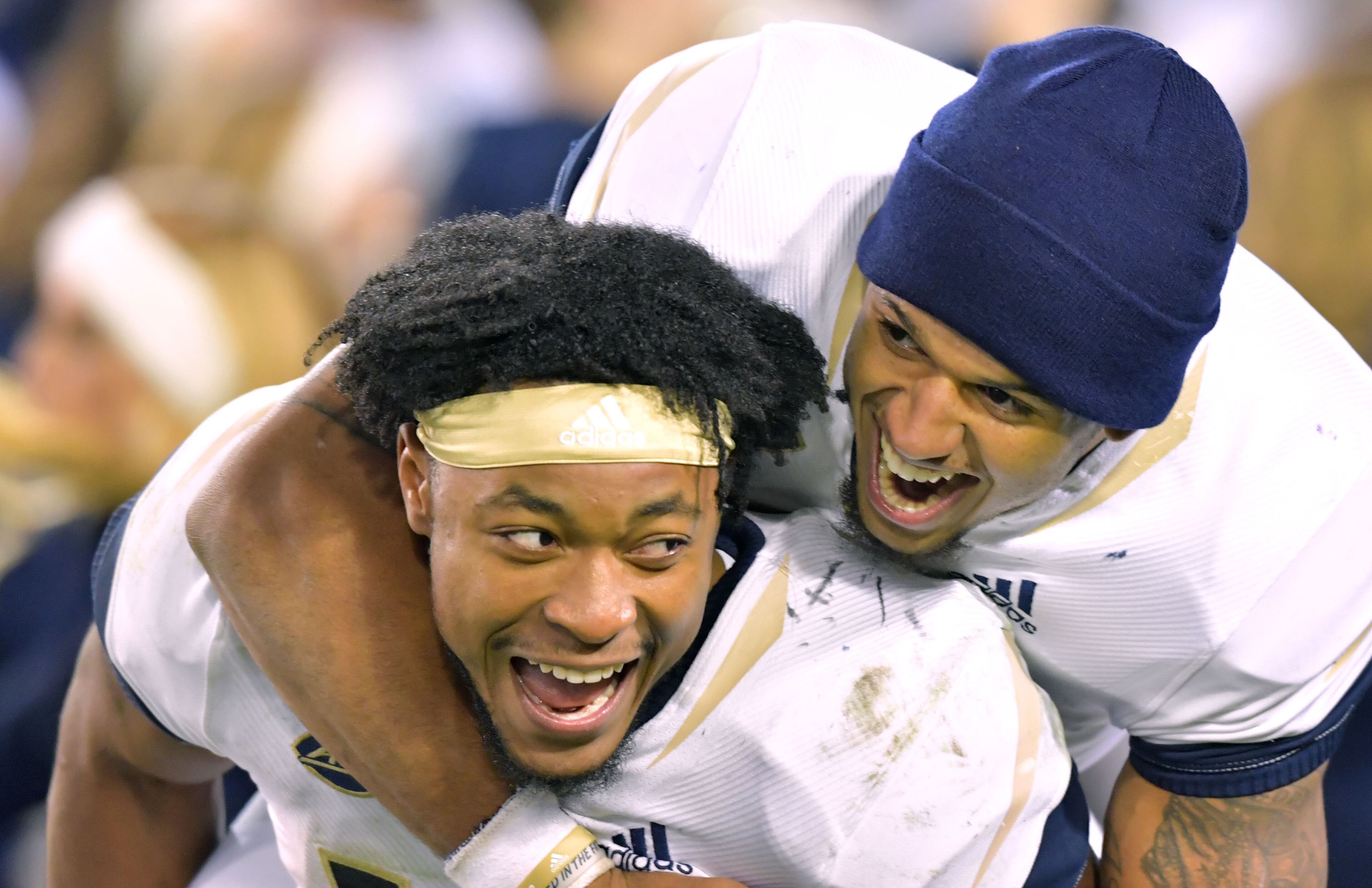 November 10, 2018 Atlanta - Georgia Tech TaQuon Marshall (16) and Tobias Oliver (8) celebrate their victory over the Miami at Bobby Dodd Stadium on Saturday, November 10, 2018. Georgia Tech won 27 - 21 over the Miami. HYOSUB SHIN / HSHIN@AJC.COM