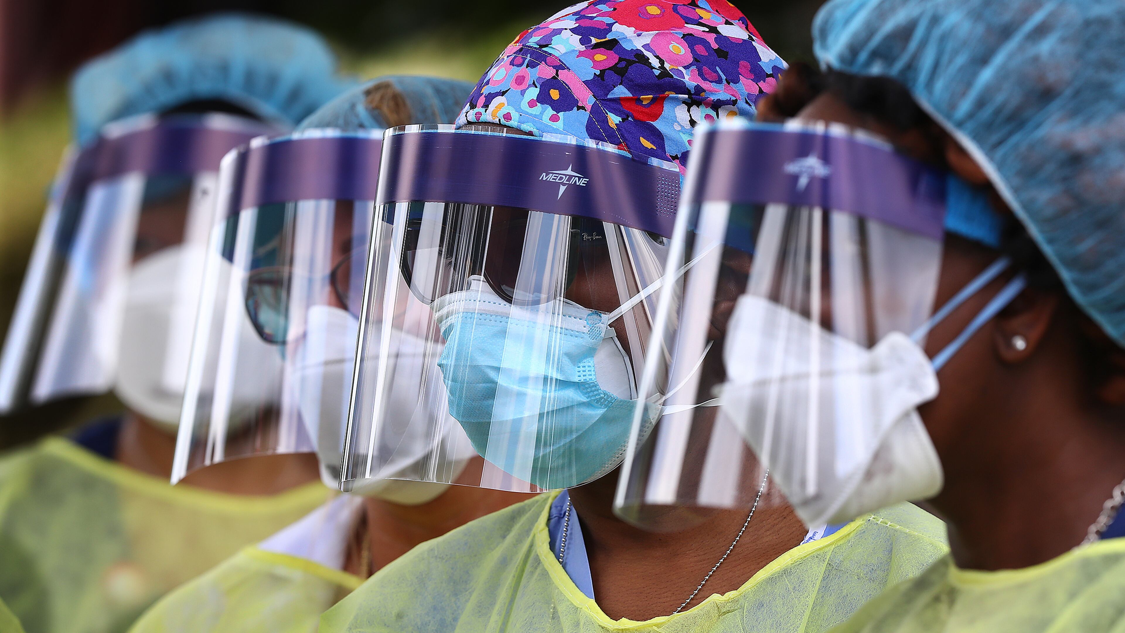 In May, specimen collection volunteers lined up to take hundreds of free COVID-19 tests at a pop-up site at the House of Hope in Decatur. As temperatures have warmed with the start of summer, coronavirus cases are spiking throughout the state again. CURTIS COMPTON / CCOMPTON@AJC.COM