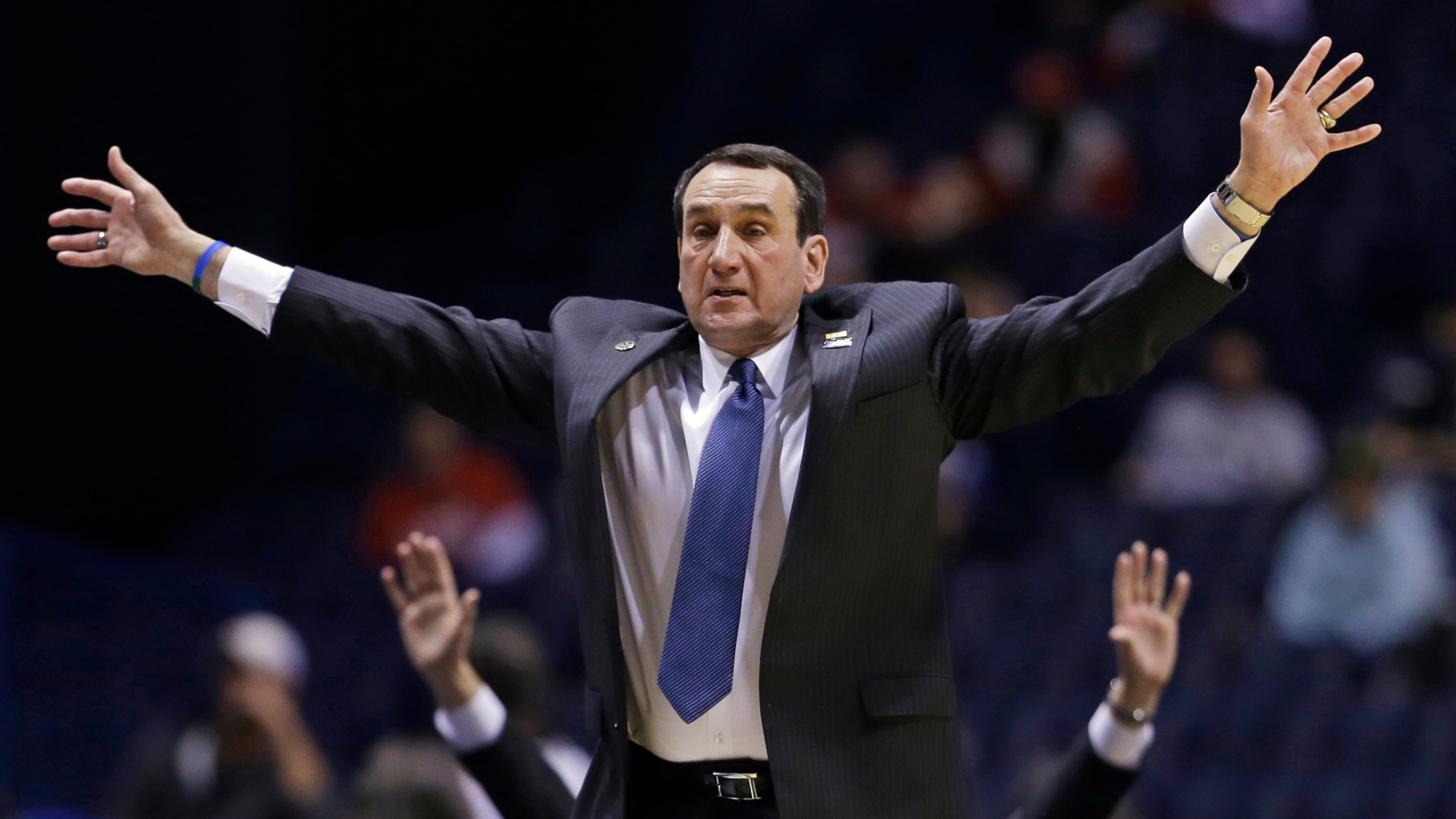 Duke head coach Mike Krzyzewski directs his team during the second half of a regional semifinal against Michigan State in the NCAA college basketball tournament, Friday, March 29, 2013, in Indianapolis. (AP Photo/Darron Cummings)