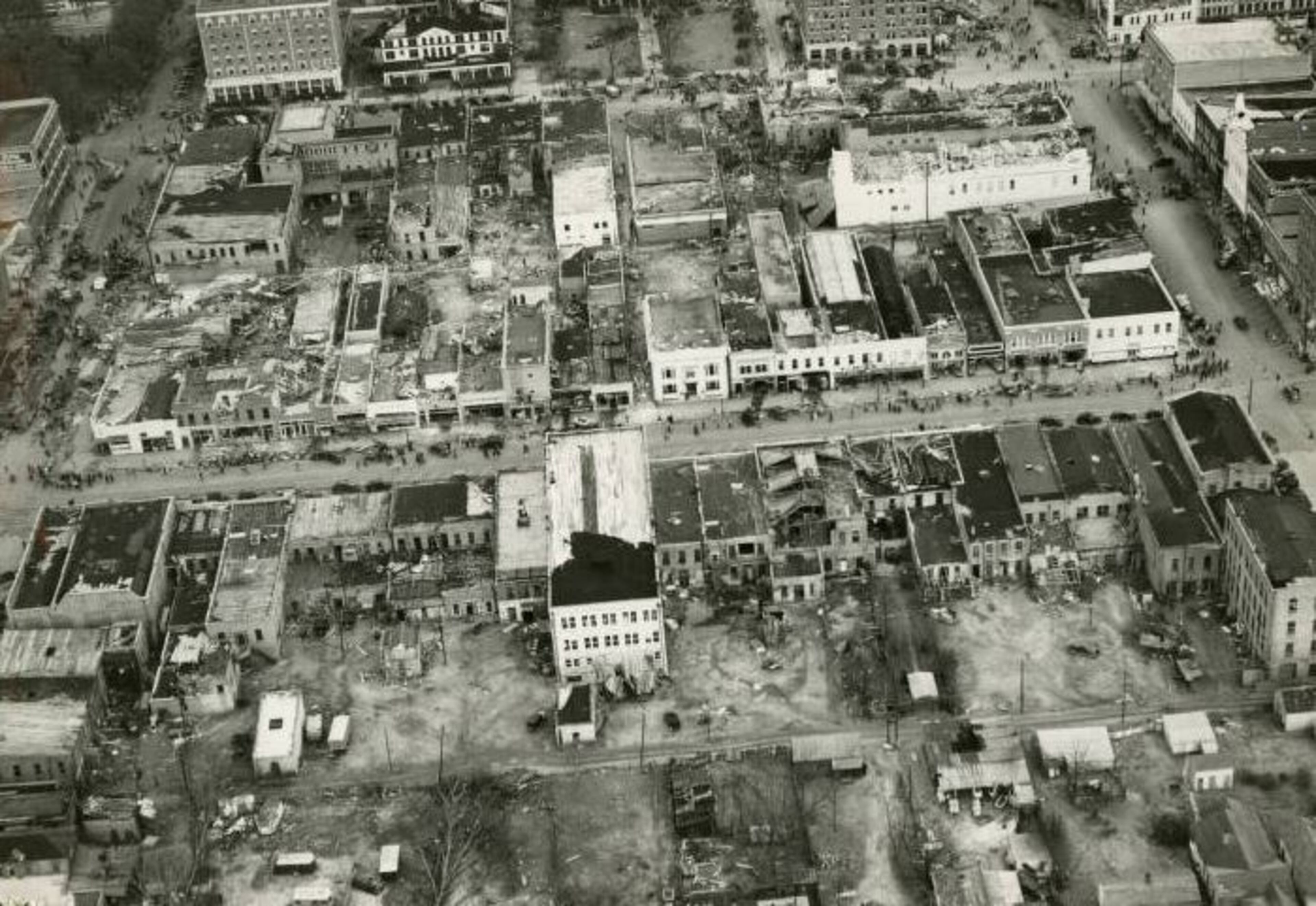 February 1940 -- In this aerial view of Albany, Ga., after a Feb. 10 tornado, crowds of people walking in the streets are shown. CREDIT: AJC Archives