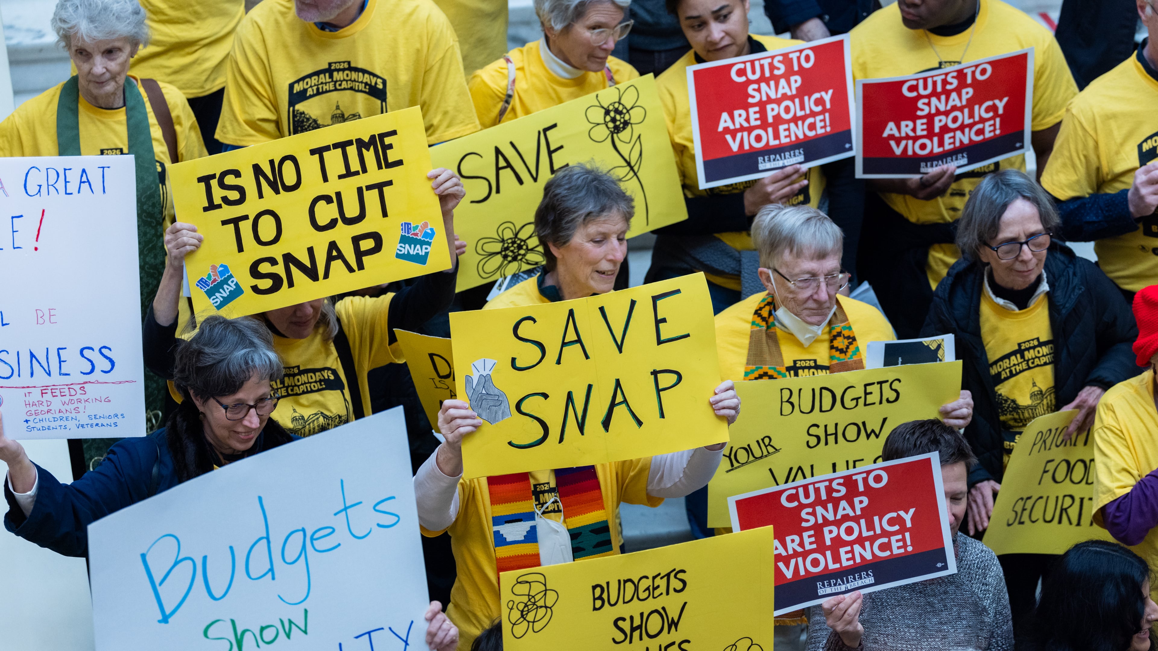 Demonstrators advocate for the Supplemental Nutrition Assistance Program, or SNAP, on the first day of the legislative session at the Capitol in Atlanta on Monday, Jan. 12, 2026. (Arvin Temkar/AJC)