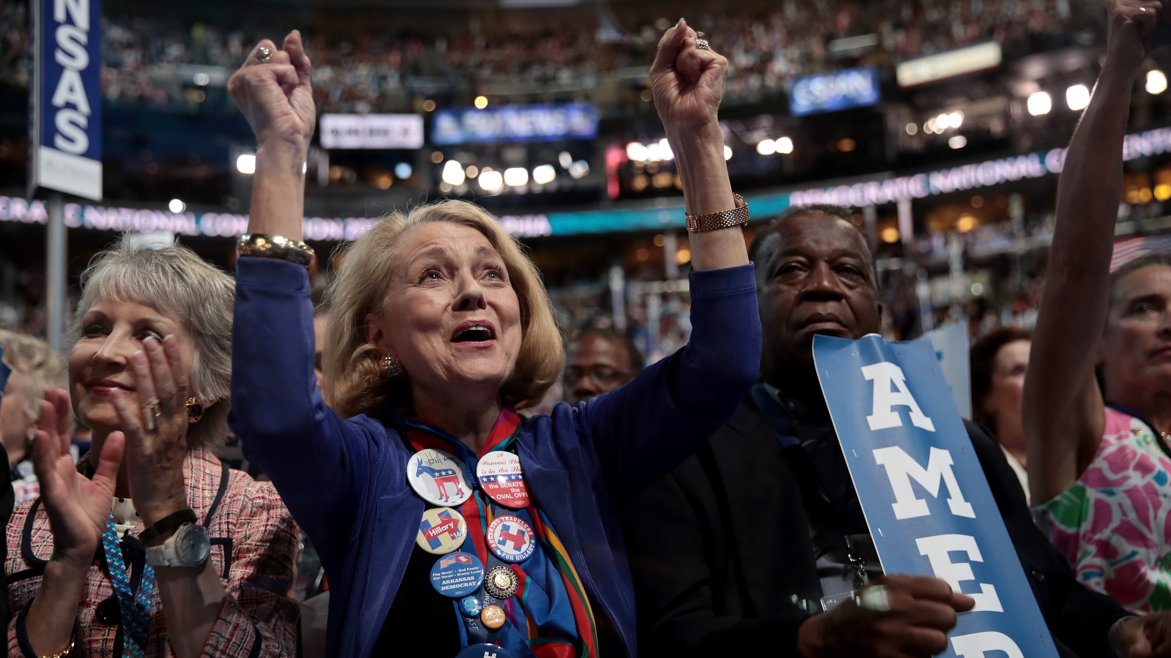 PHILADELPHIA, PA - JULY 26: Delegates stand and cheer during the evening session on the second day of the Democratic National Convention at the Wells Fargo Center, July 26, 2016 in Philadelphia, Pennsylvania. Democratic presidential candidate Hillary Clinton received the number of votes needed to secure the party's nomination. An estimated 50,000 people are expected in Philadelphia, including hundreds of protesters and members of the media. The four-day Democratic National Convention kicked off July 25. (Photo by Drew Angerer/Getty Images)