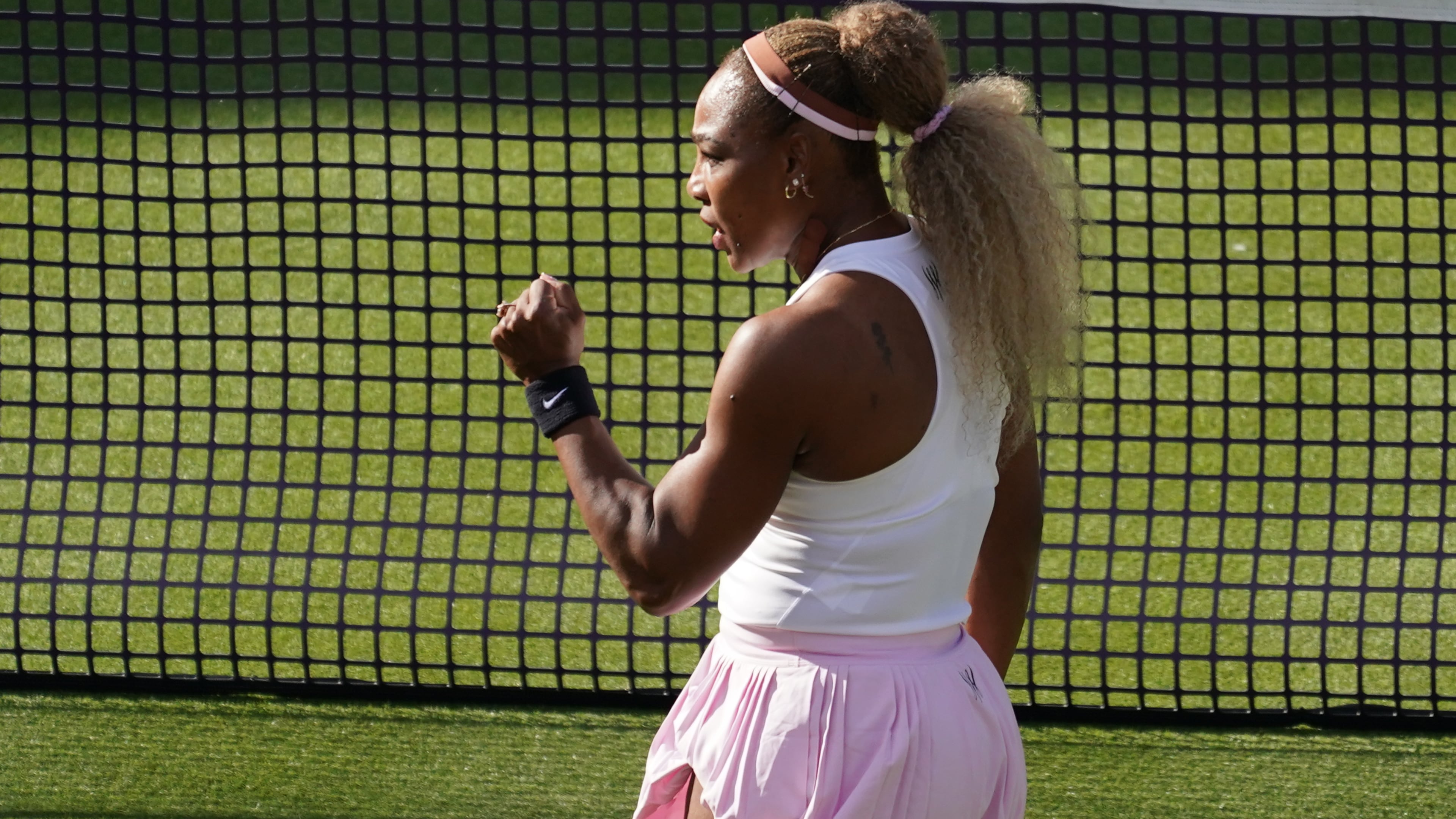 Serena Williams of the United States, celebrates winning a point as she and playing partner Victoria Mboko of Canada play against Nicole Melichar-Martinez of Canada and Erin Routliffe of New Zealand during their first round doubles match at the Queen's Club tennis championships in London, Tuesday, June 9, 2026. (AP Photo/Alberto Pezzali)
