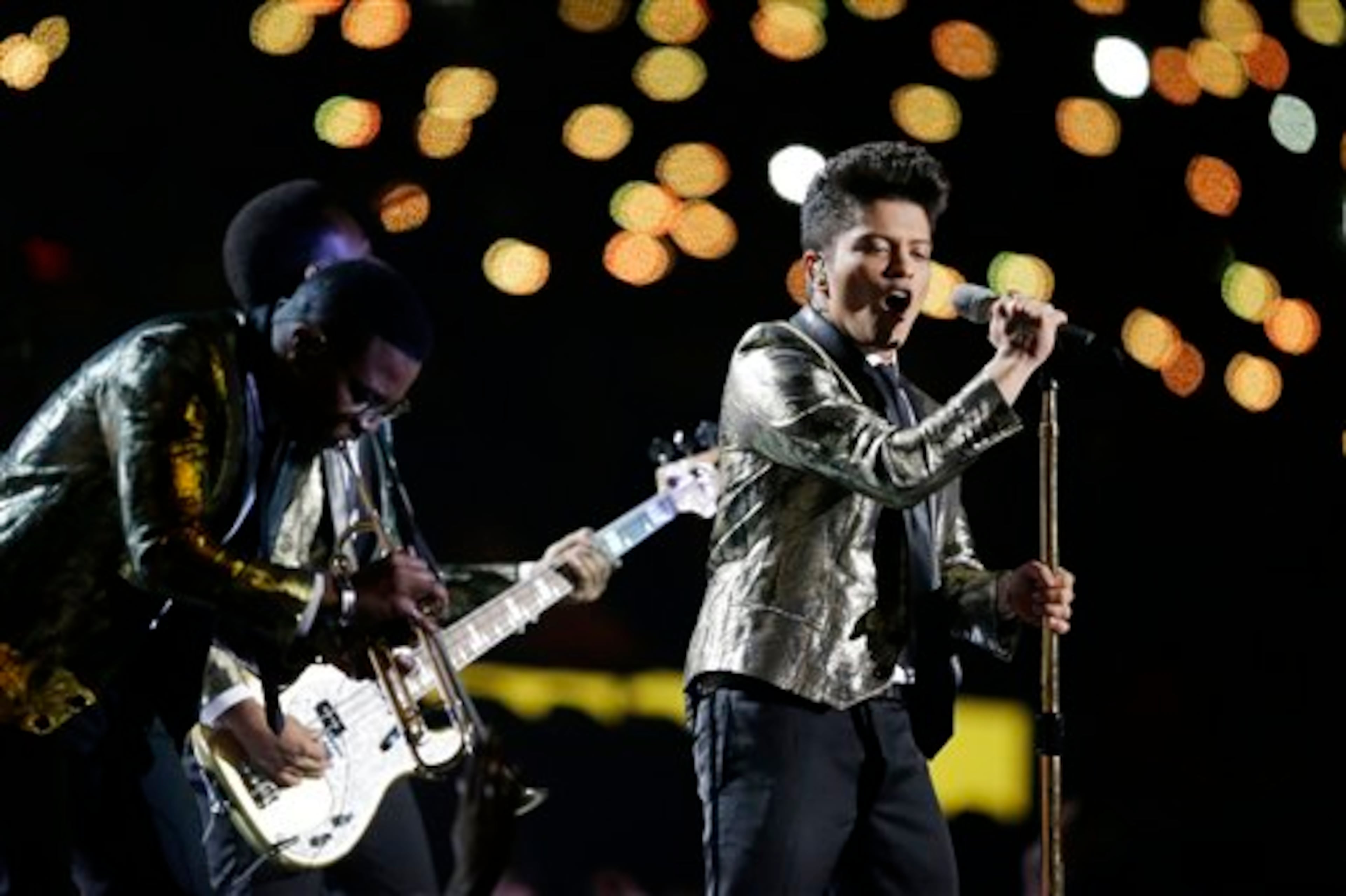 Bruno Mars performs during the halftime show of the NFL Super Bowl XLVIII football game Sunday, Feb. 2, 2014, in East Rutherford, N.J. (AP Photo/Julio Cortez)