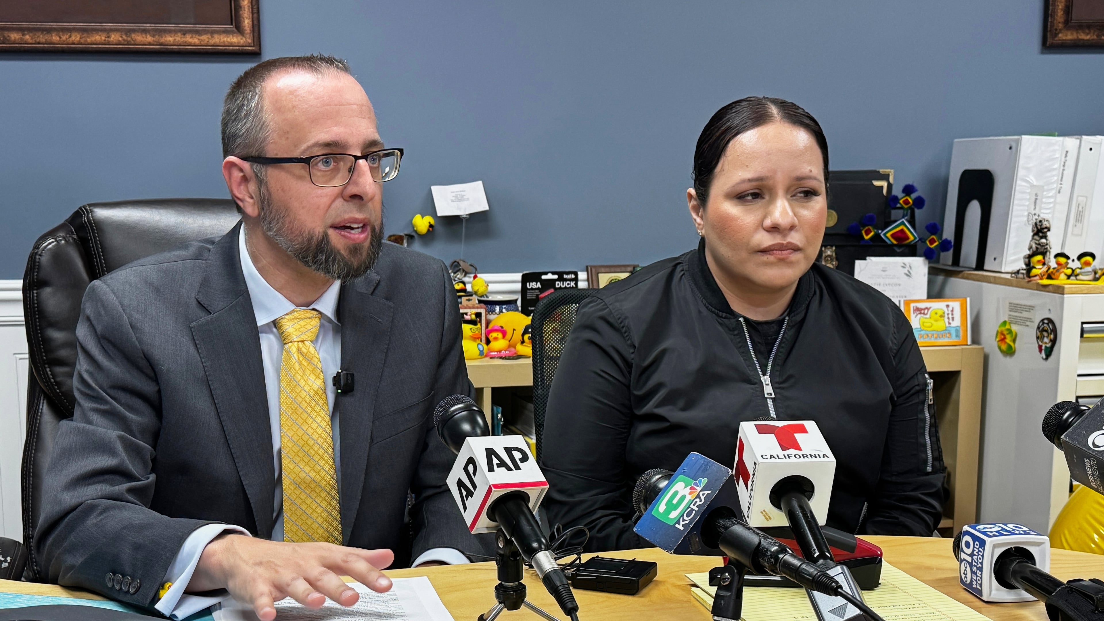 Patrick Kolasinski, attorney for Carlos Ivan Mendoza Hernandez, speaks at a news conference accompanied by his client's girlfriend, Cindy, in Modesto, Calif., Wednesday, April 8, 2026. (AP Photo/Terry Chea)