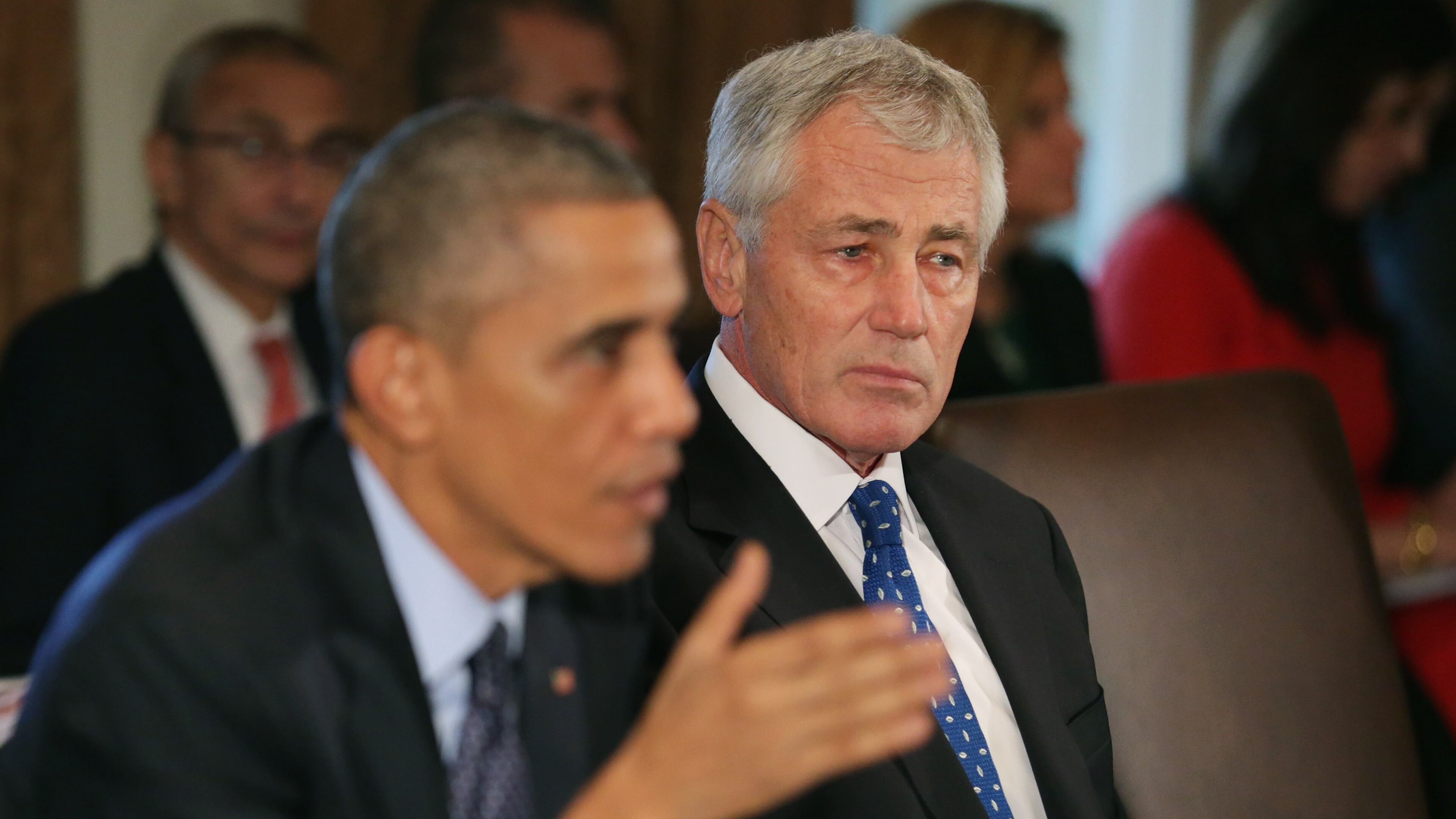 WASHINGTON, DC - NOVEMBER 07: Defense Secretary Chuck Hagel (R) listens as U.S. President Barack Obama speaks to members of the news media before a meeting with Hagel and other members of the president's cabinet at the White House November 7, 2014 in Washington, DC. Obama talked about the positive economic news and what priorities his administration will be focused on after last Tuesday's election, where the Republicans won a decisive victory in local, state and national races. (Photo by Chip Somodevilla/Getty Images)