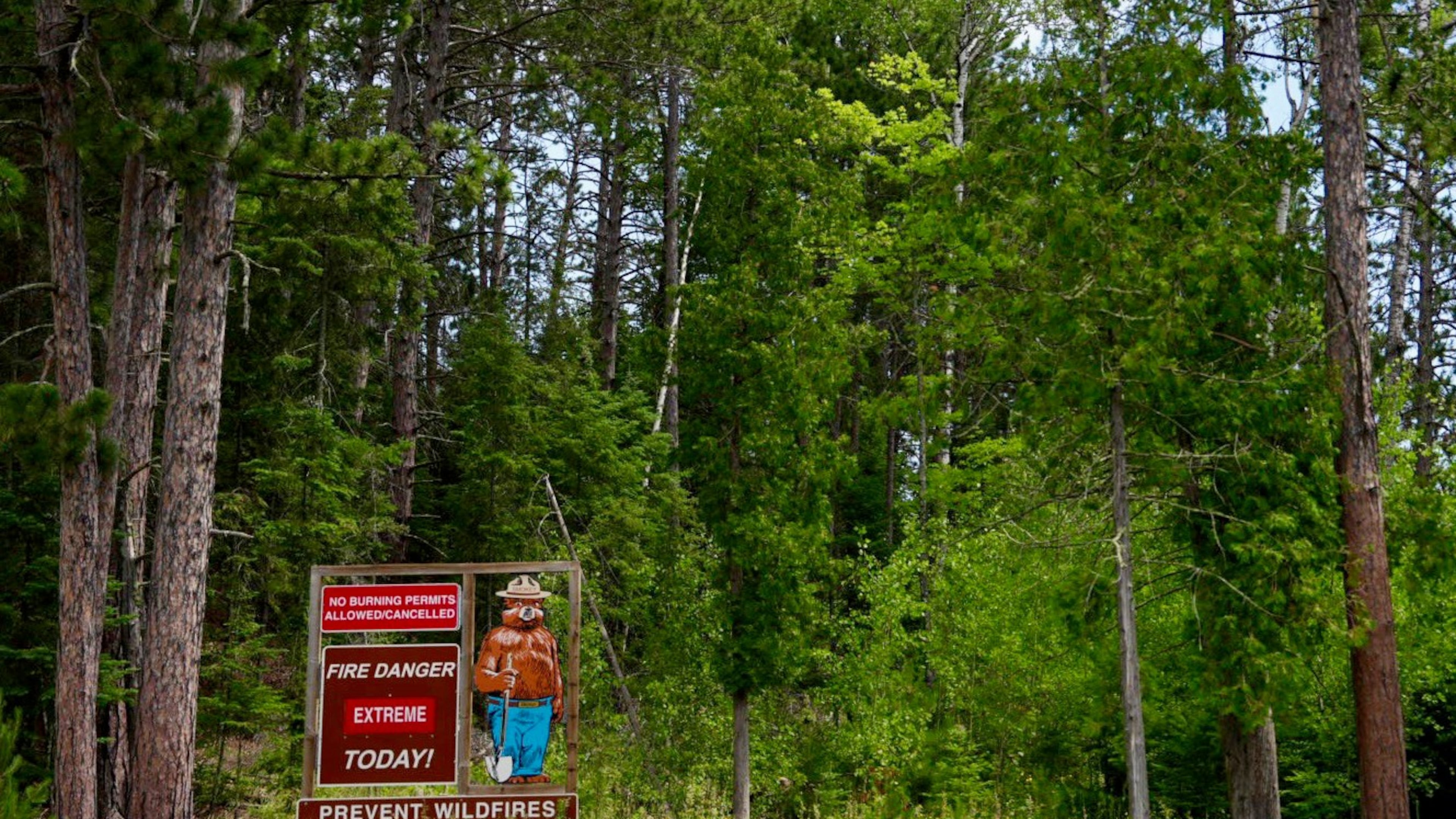 Signage near the Minnesota Department of Natural Resources' office in Tower, Minn., notes extreme fire danger ,Tuesday, July 14, 2026. (Anthony Soufflé/Minnesota Star Tribune via AP)