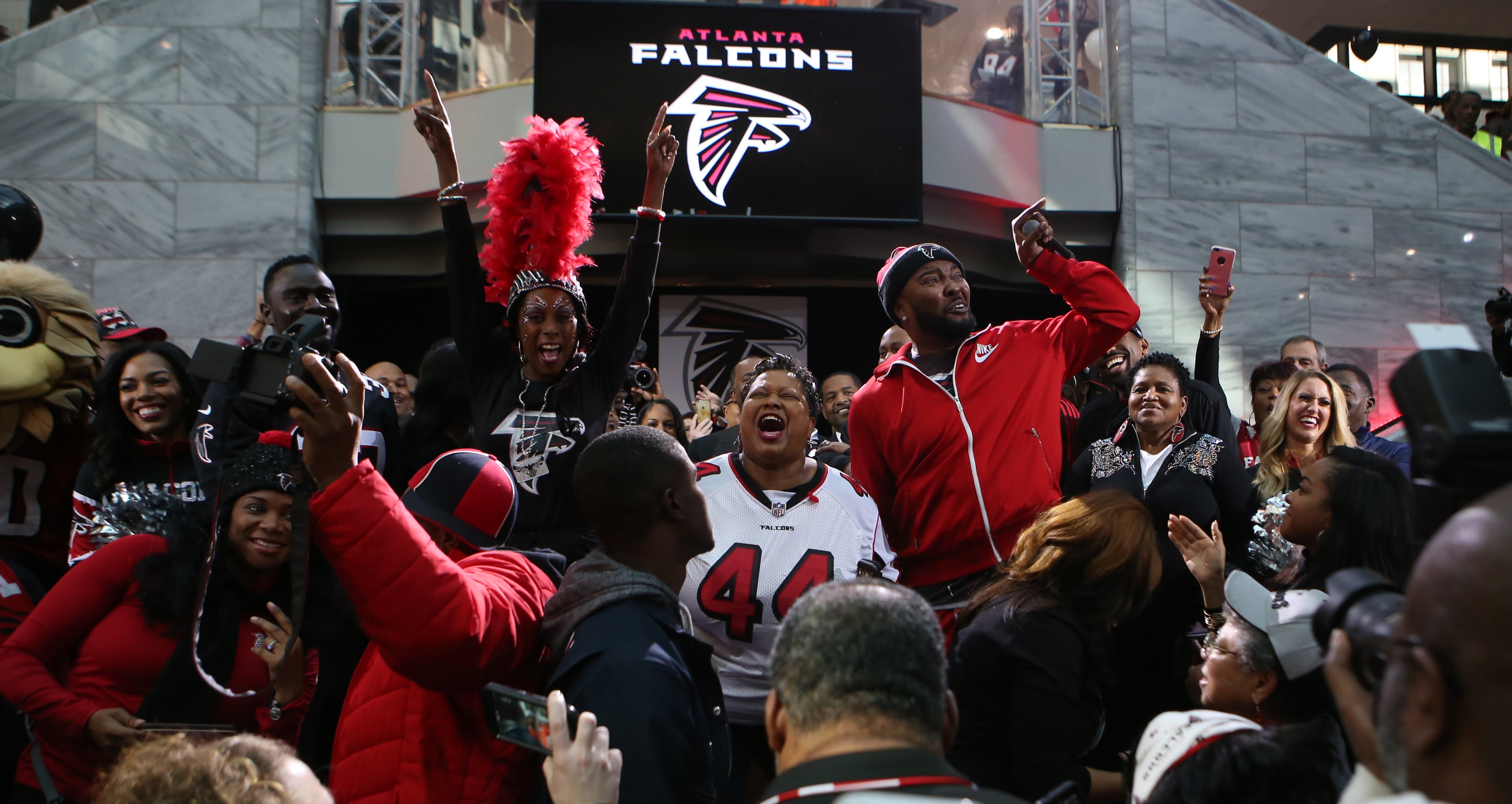 January 27, 2017, Atlanta, Georgia - Falcons fans take the stage at the Atlanta Falcons pep rally held by Mayor Kasim Reed at City hall in Atlanta, Georgia, on Friday, January 27, 2017. (HENRY TAYLOR / HENRY.TAYLOR@AJC.COM)