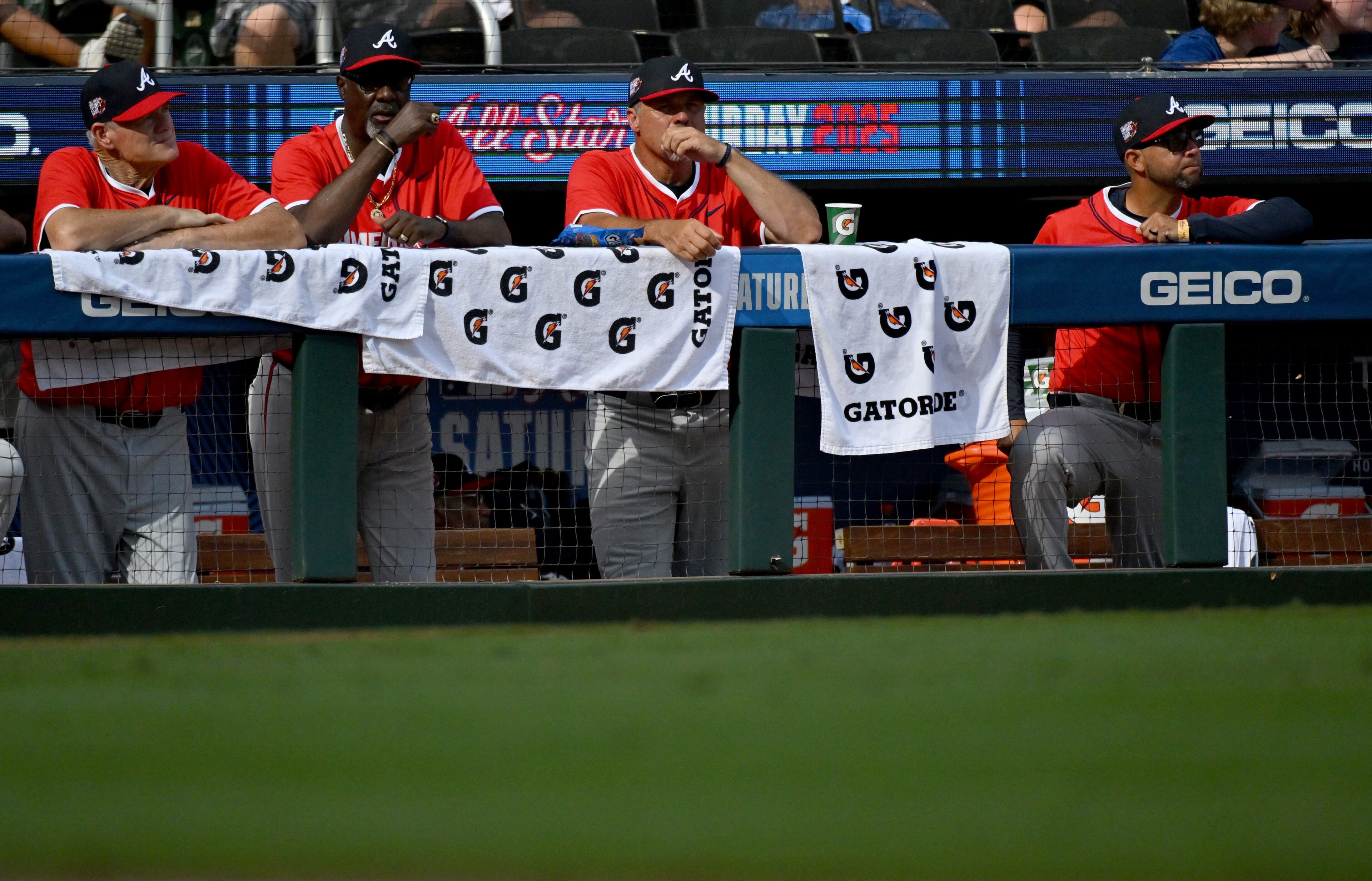 American League coaching staff watch from the dugout during the fourth inning of the All-Star Futures Game at Truist Park, Saturday, July 12, 2025, in Atlanta. National League won 4-2 over American League. (Hyosub Shin / AJC)
