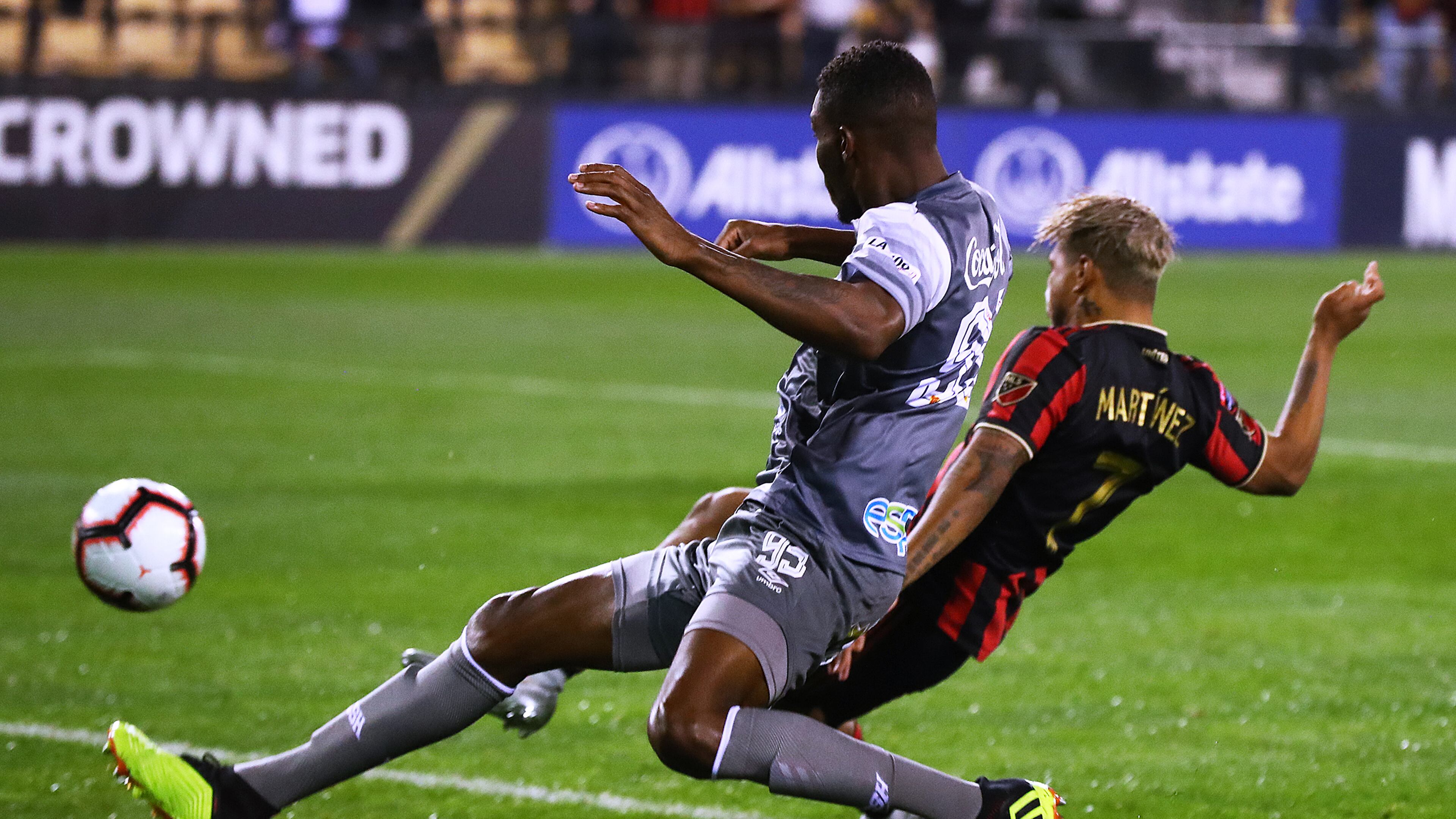 Feb. 28, 2019 Kennesaw: Atlanta United foward Josef Martinez scores a goal past C.S. Herediano defender Keyner Brown for a 1-0 lead in their Concacaf Champions League soccer match on Thursday, Feb. 28, 2019, in Kennesaw. Curtis Compton/ccompton@ajc.com