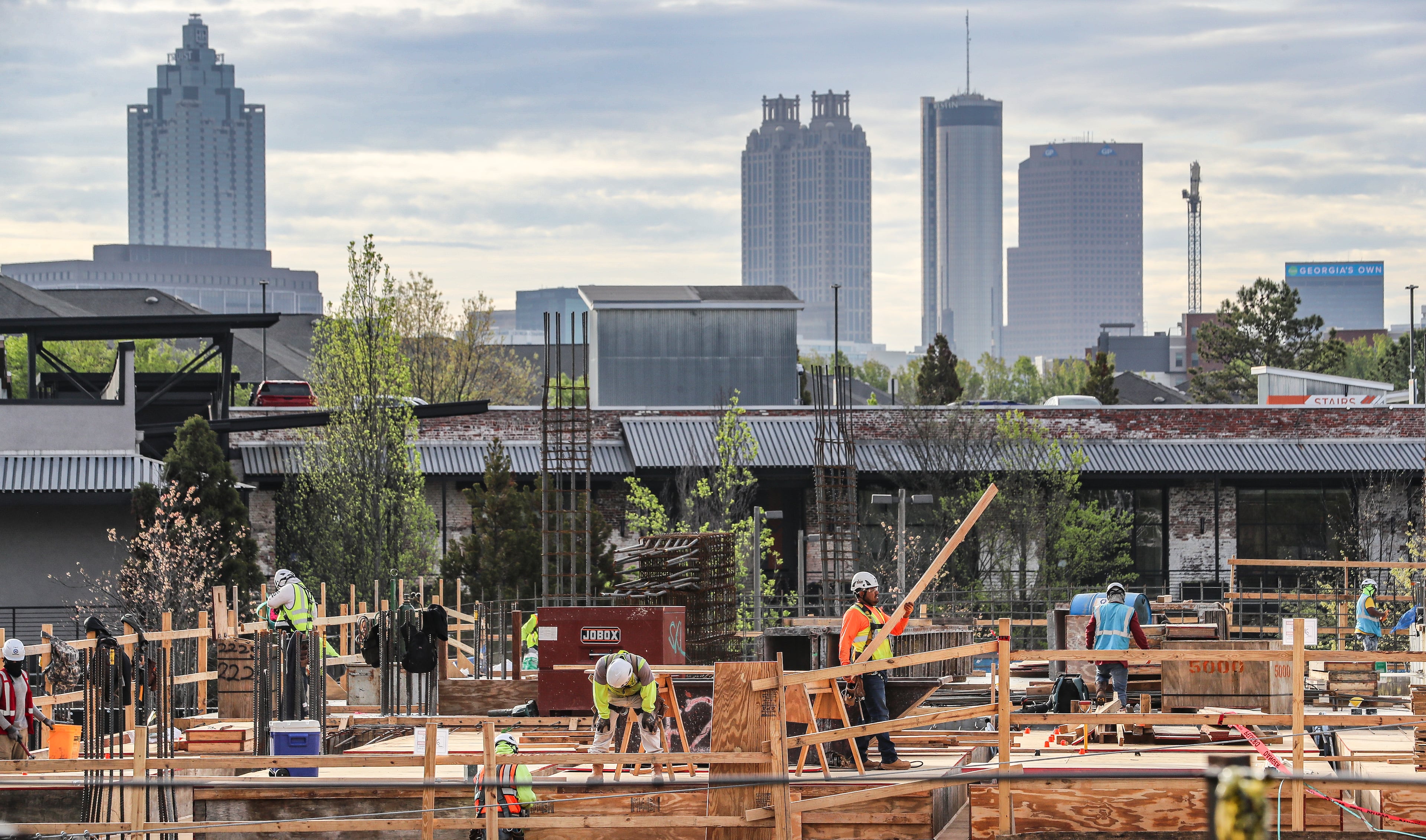 Workers construct 1050 Brickworks in West Midtown on Tuesday, March 28, 2023. (John Spink/AJC 2023)