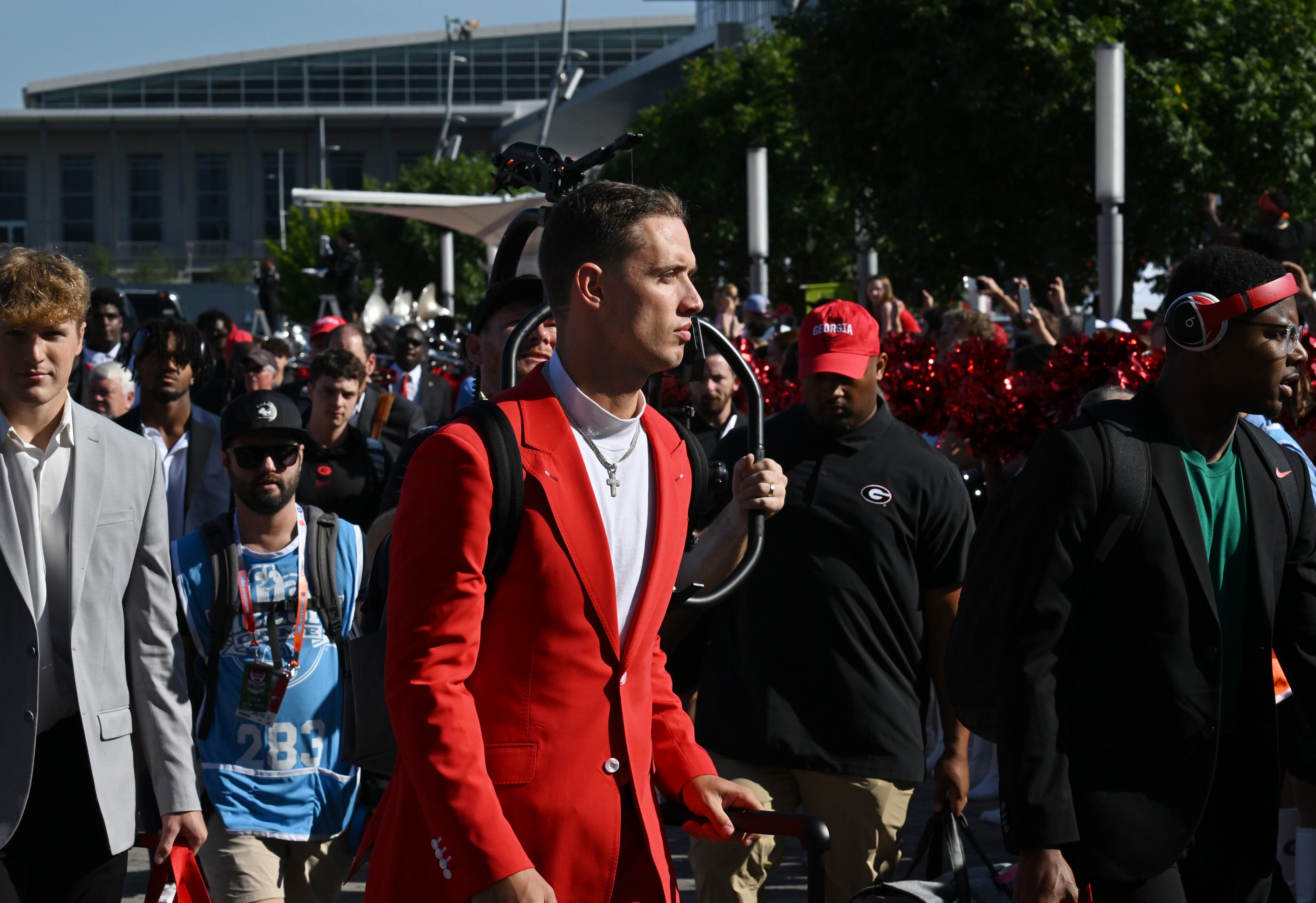 Georgia quarterback Carson Beck and other players participate in the Dawg Walk before an NCAA football game against Clemson at Mercedes-Benz Stadium, Saturday, August 31, 2024, in Atlanta. (Hyosub Shin / AJC)